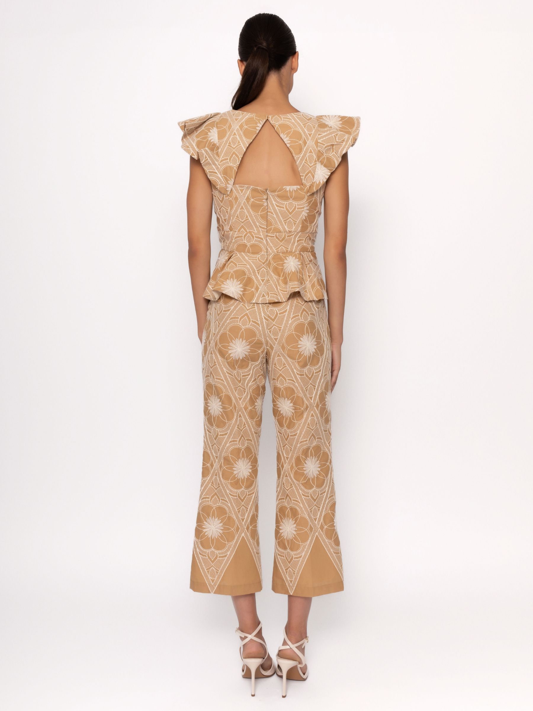 Arggido 49568 top and trouser set with ruffle shoulder peplum top, keyhole back detail and cropped ankle-length trousers.