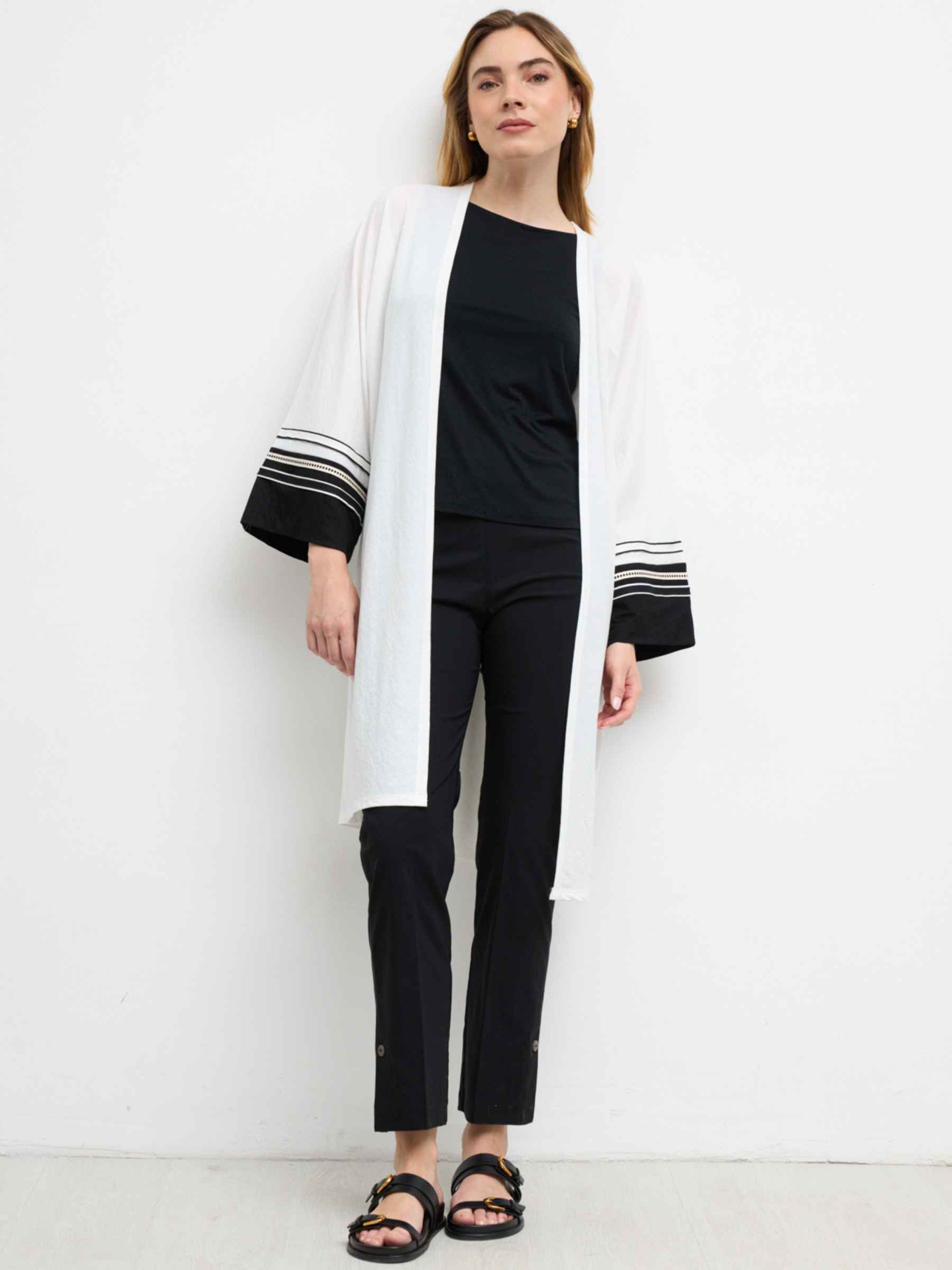 Bariloche Adagio Knitwear longline open-front cardigan with wide three-quarter sleeves and contrast stripe cuff detailing.