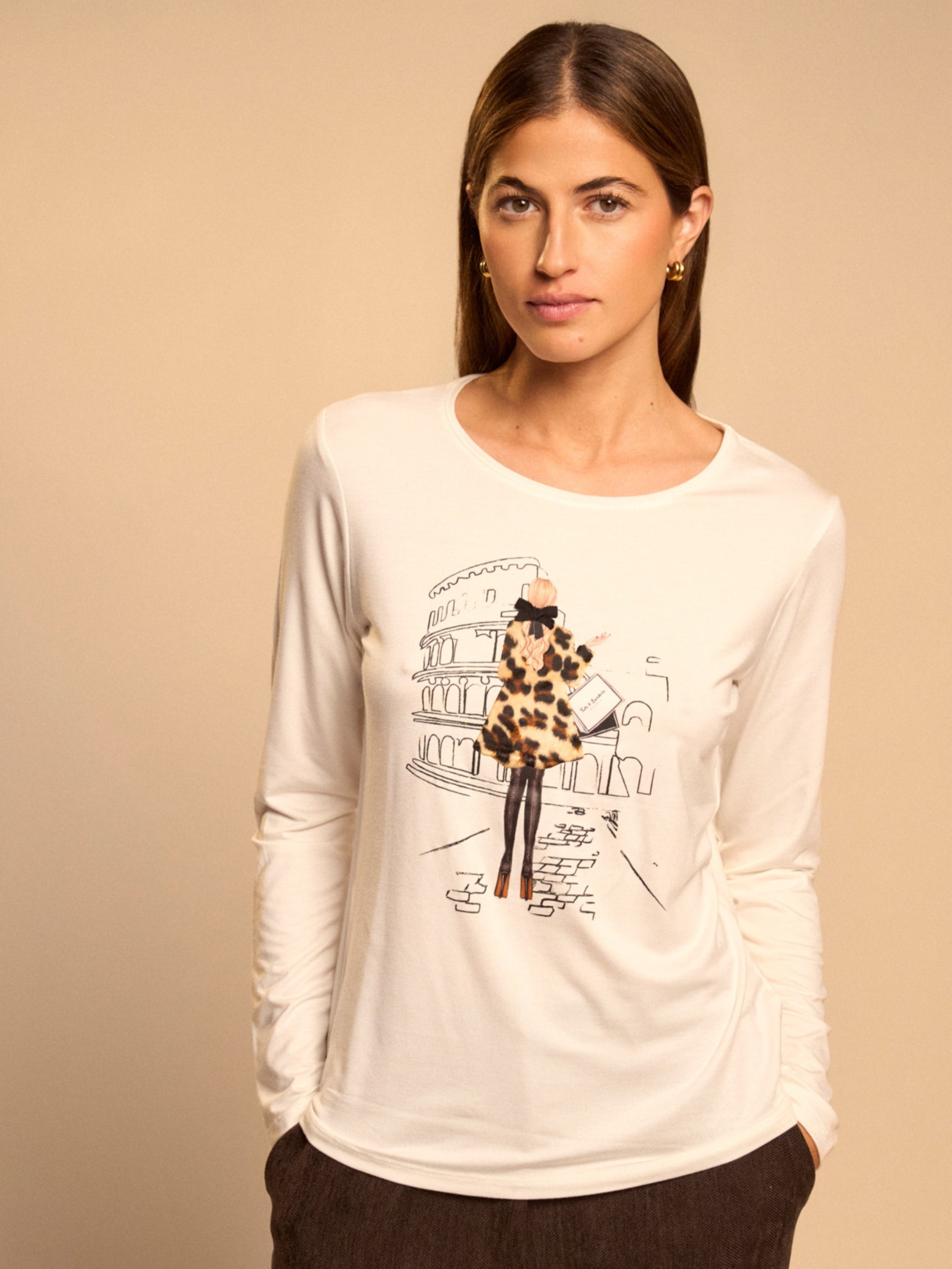 Bariloche Orozco T-Shirt with round neckline, long sleeves and illustrated fashion graphic across the front.