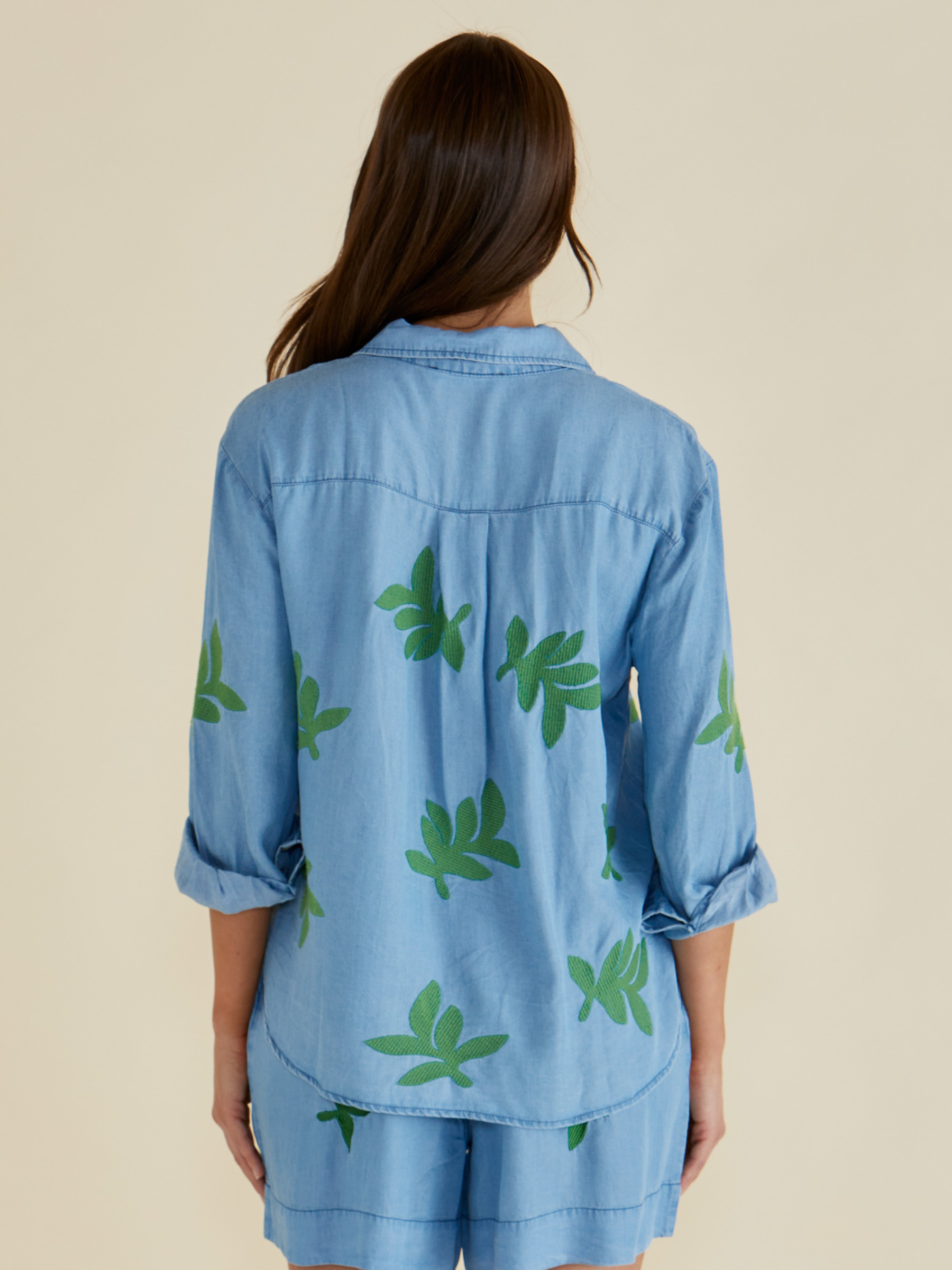 Betty Daria Lyocell Shirt with collar, button-through front, roll-up sleeves and embroidered leaf detailing.