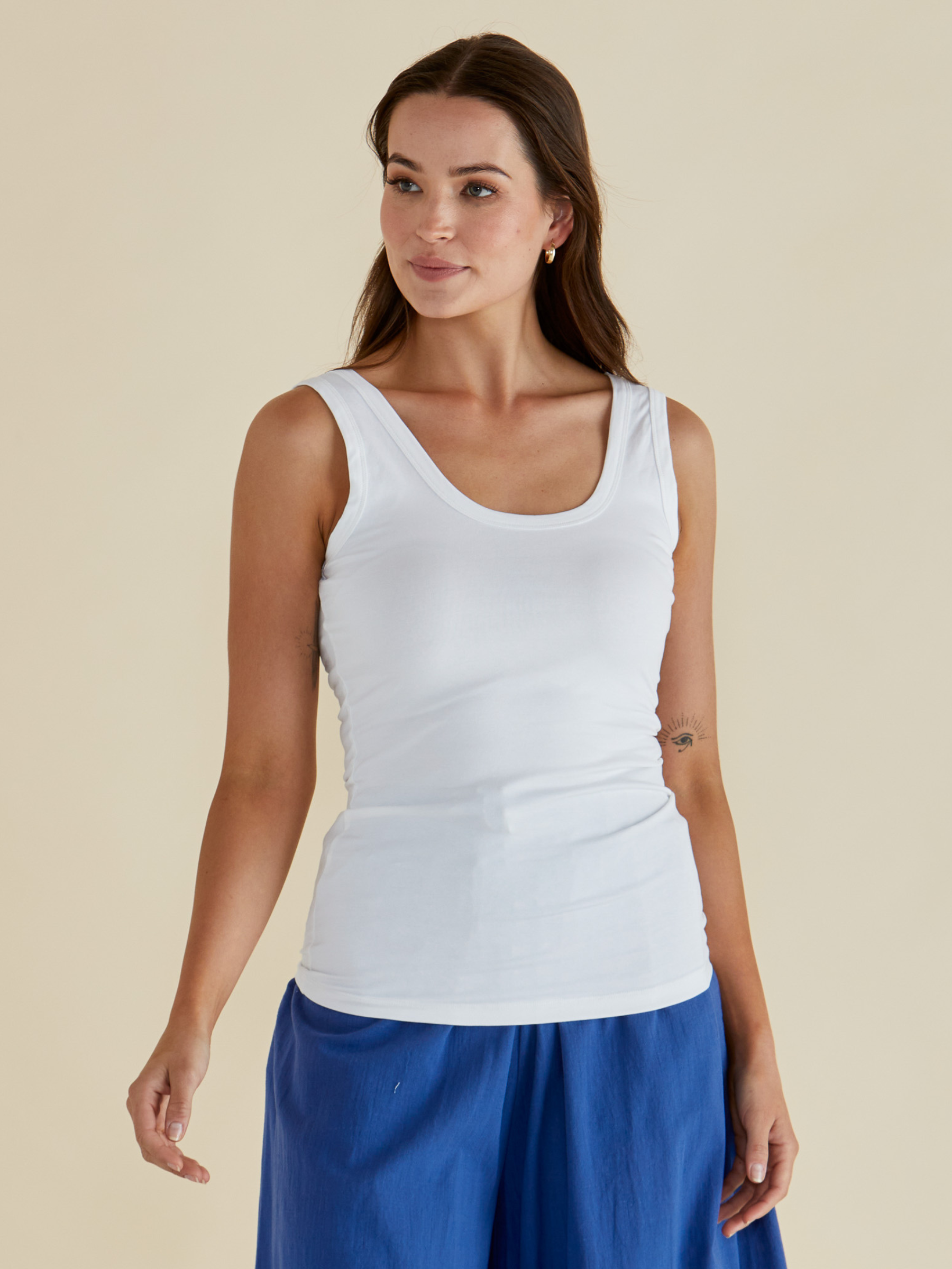 Betty Emma Scoop Tank with scoop neckline, sleeveless fitted silhouette and smooth streamlined design.