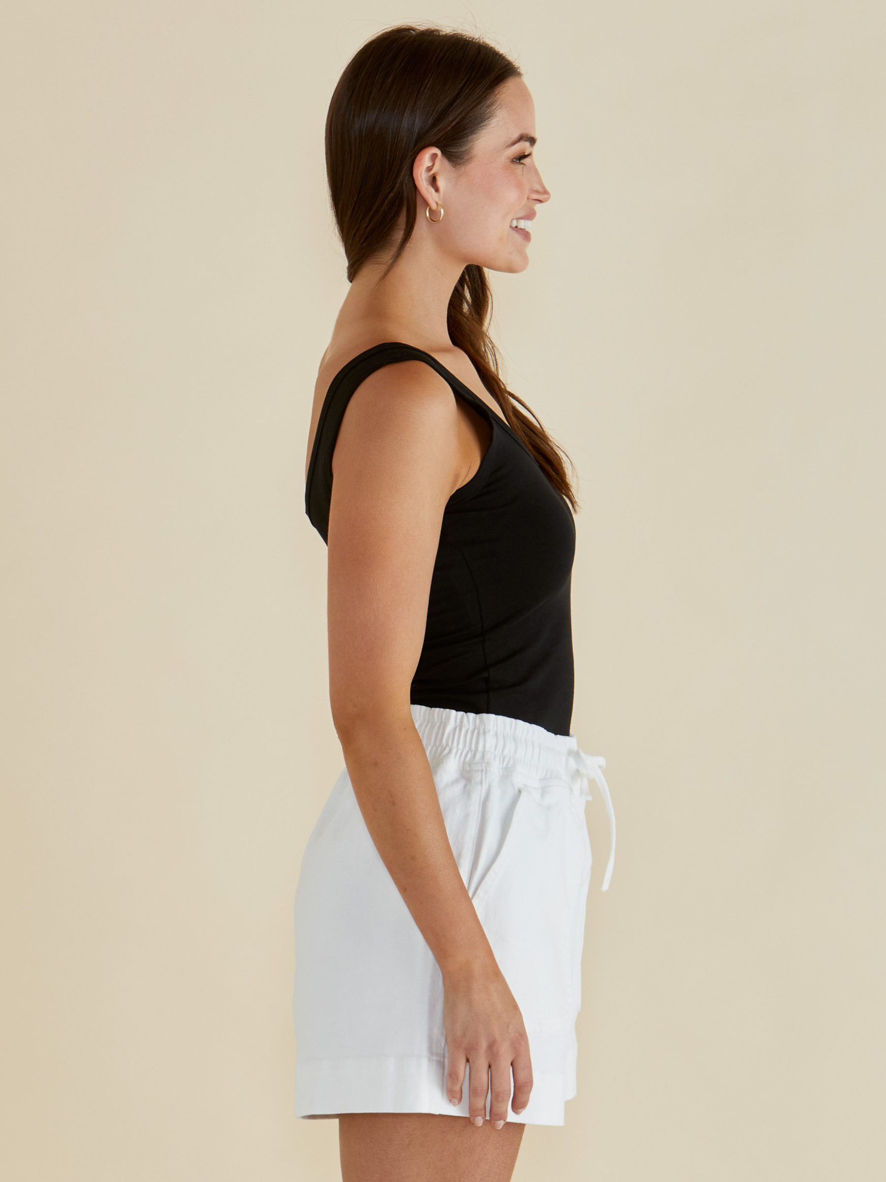 Betty Emma Scoop Tank with scoop neckline, sleeveless fitted silhouette and smooth streamlined design.