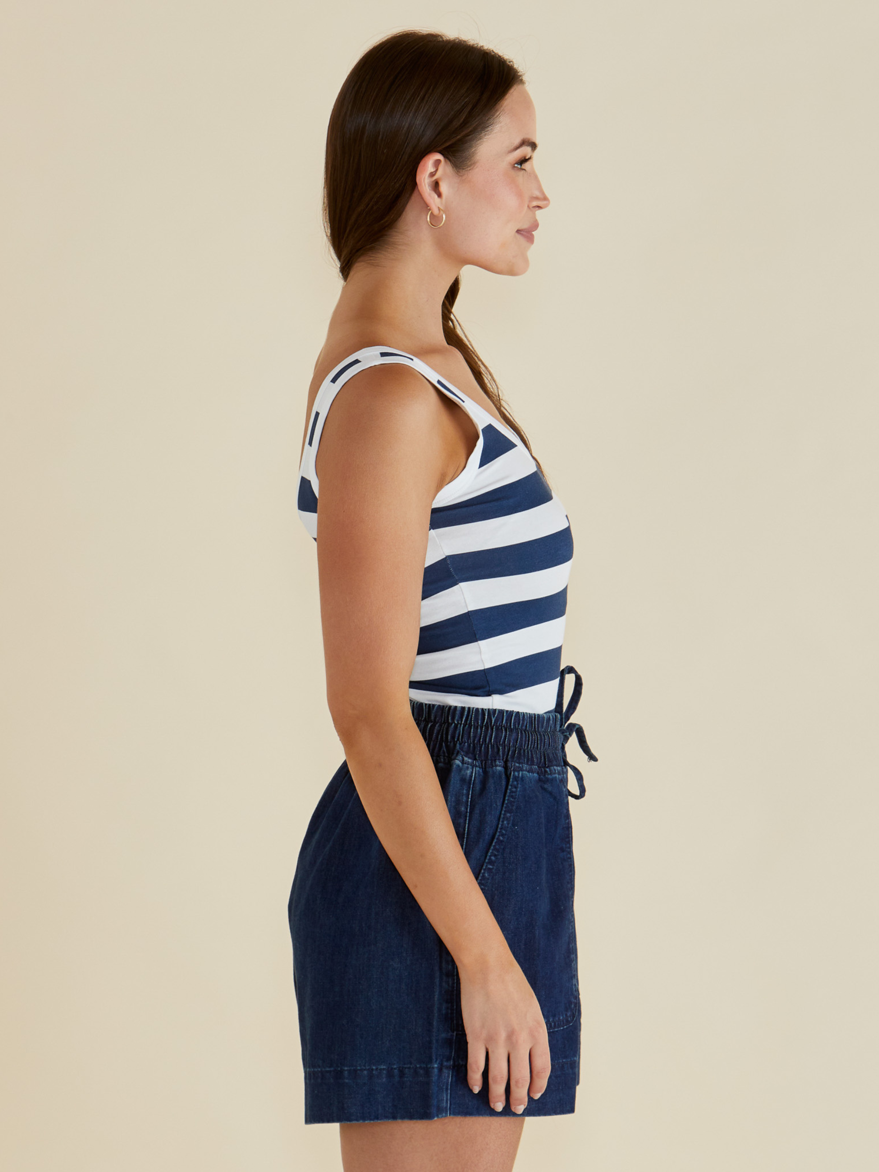 Betty Emma Scoop Tank with scoop neckline, sleeveless fitted silhouette and smooth streamlined design.