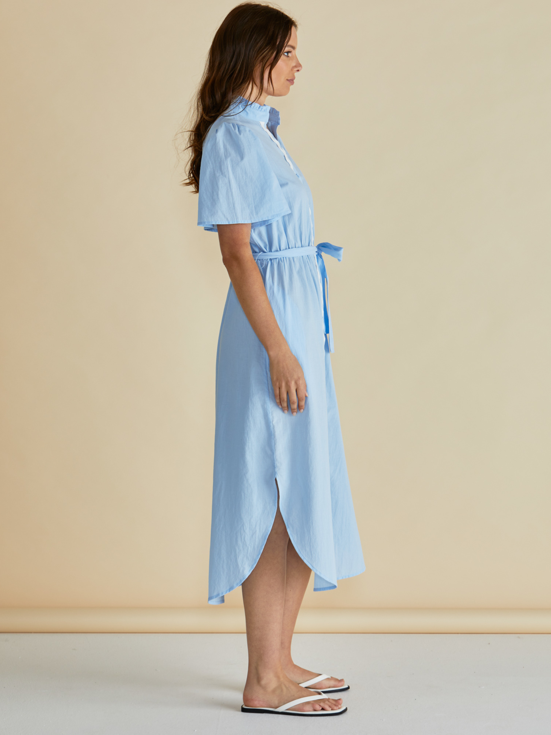 Betty Immie Dress with stand collar, button-through front, flutter sleeves and self-tie waist belt.
