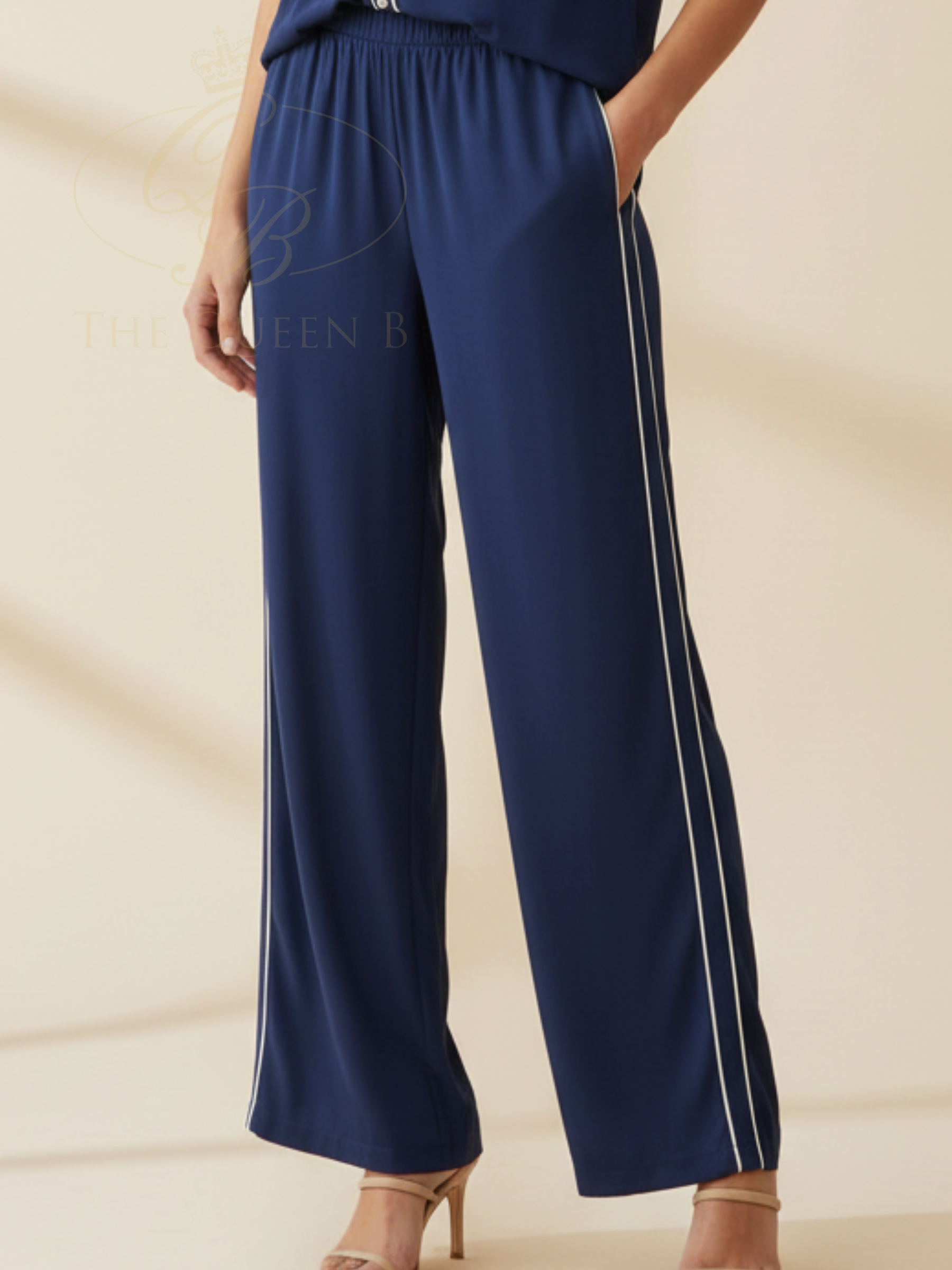 Betty Rio Reef Pants with elasticated waistband, wide-leg silhouette and side stripe detail.