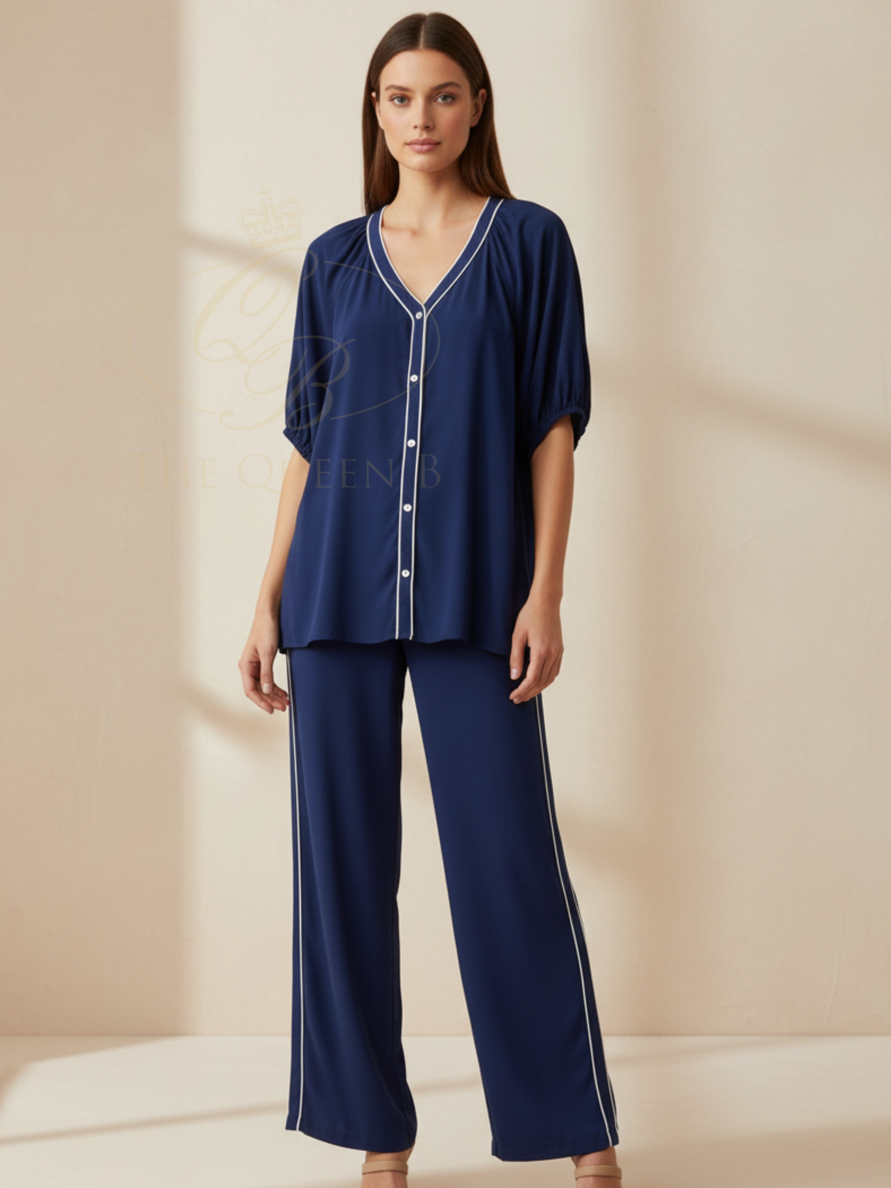 Betty Rio Reef Shirt with V neckline, contrast trim detail, button-through front and short sleeves.