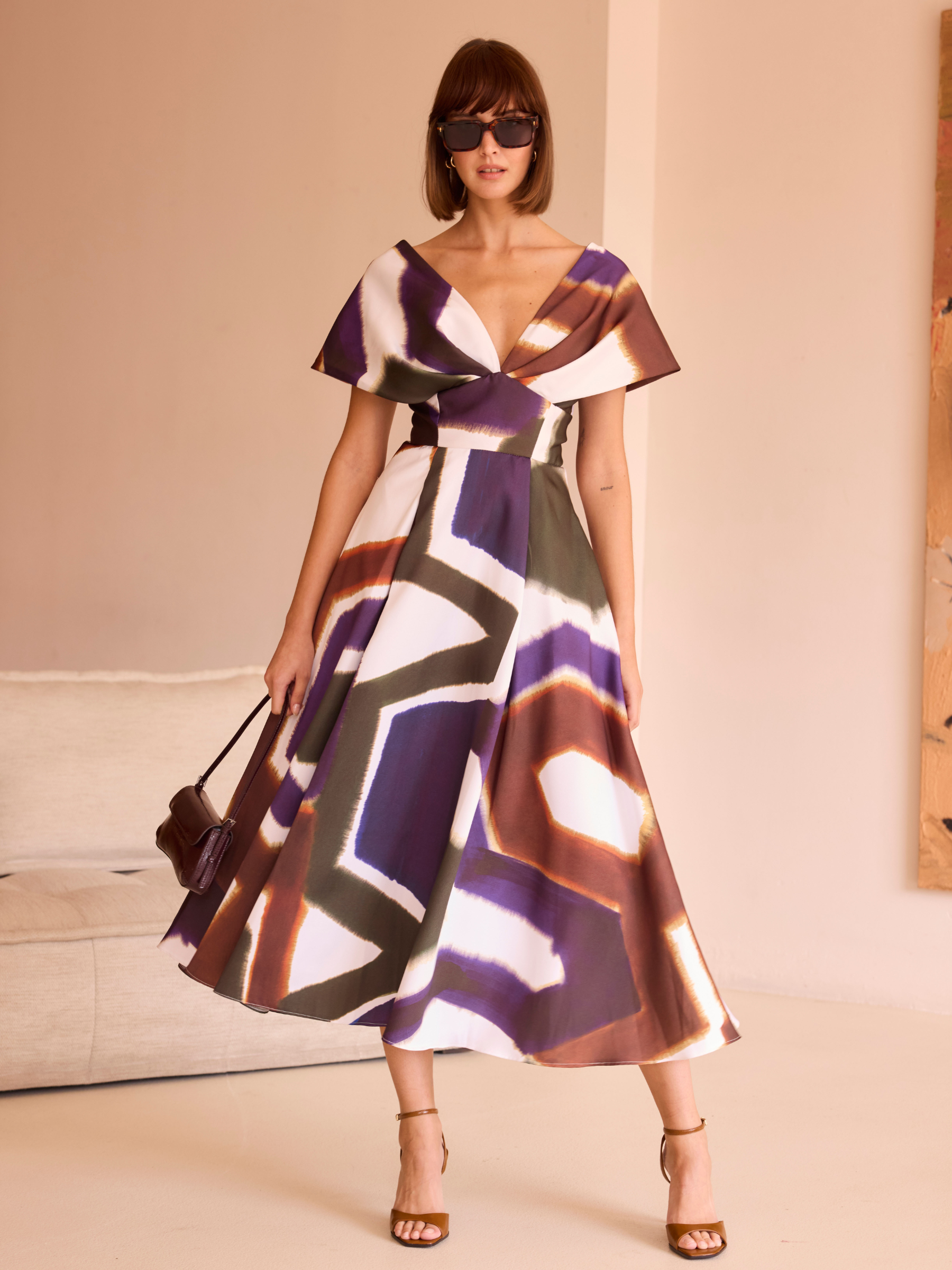 Carla Ruiz 52542 Brown Dress with abstract print, deep V-neckline, cape-effect sleeves and A-line midi skirt.
