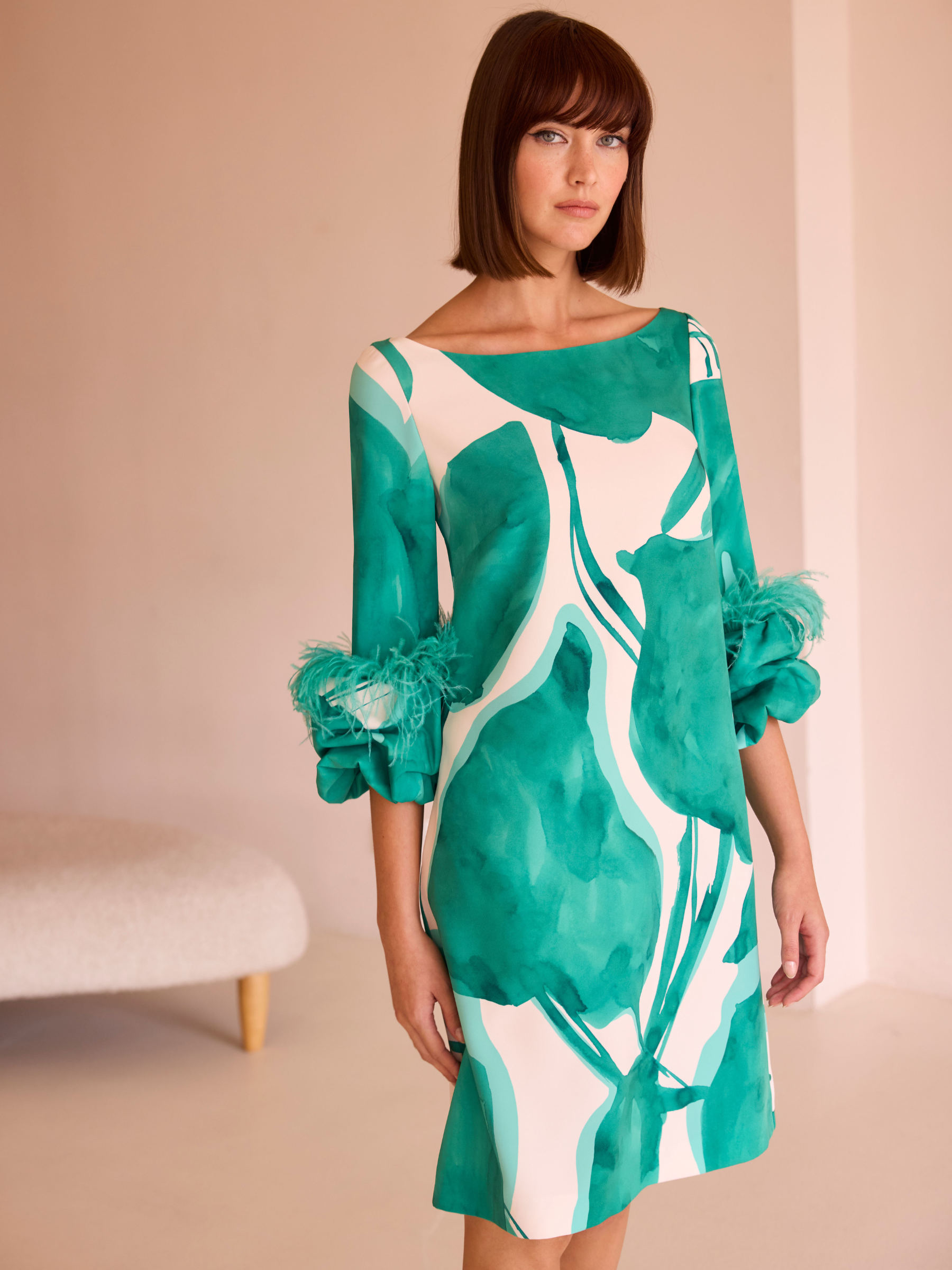 Carla Ruiz 52570 Green Dress with abstract print, boat neckline, A-line mini silhouette and feather-trimmed sleeves.