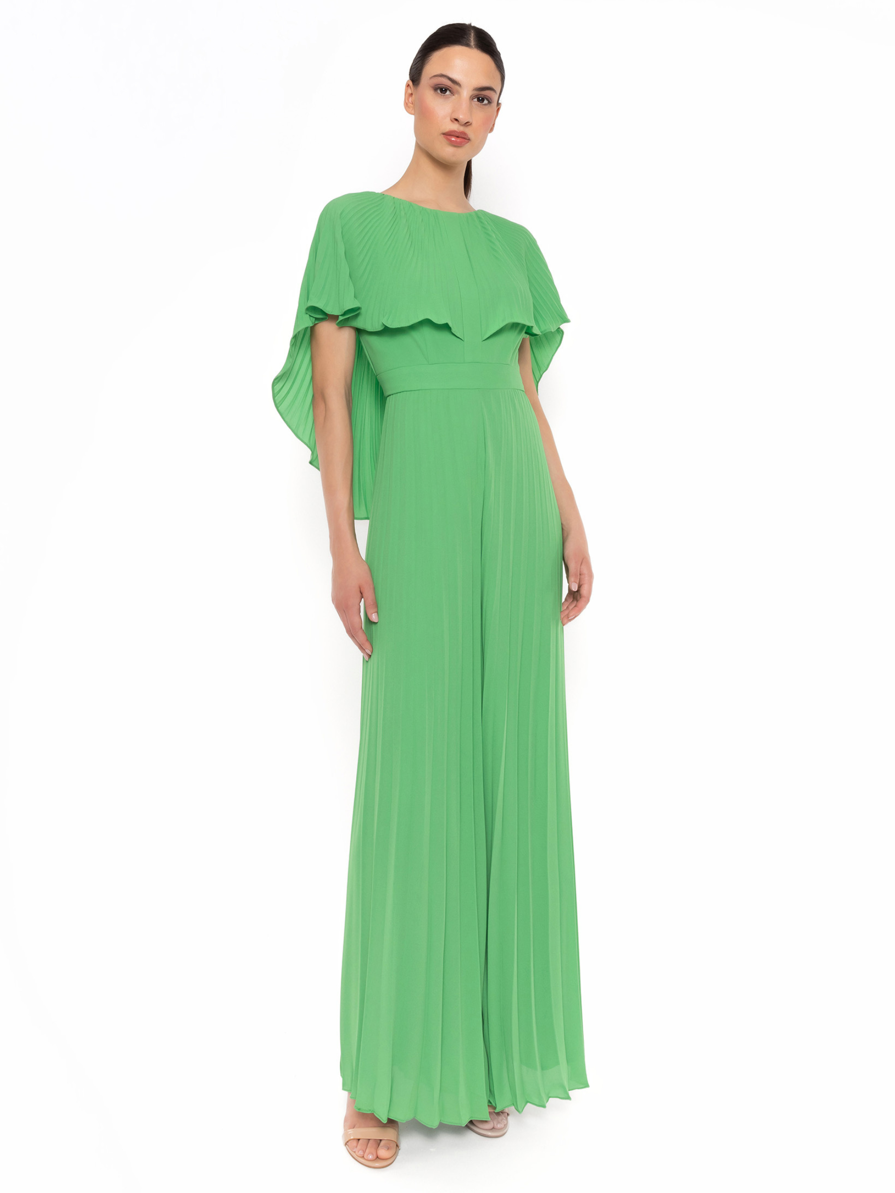 Carla Ruiz 52725 green jumpsuit with cape overlay, pleated wide-leg trousers and defined waist.