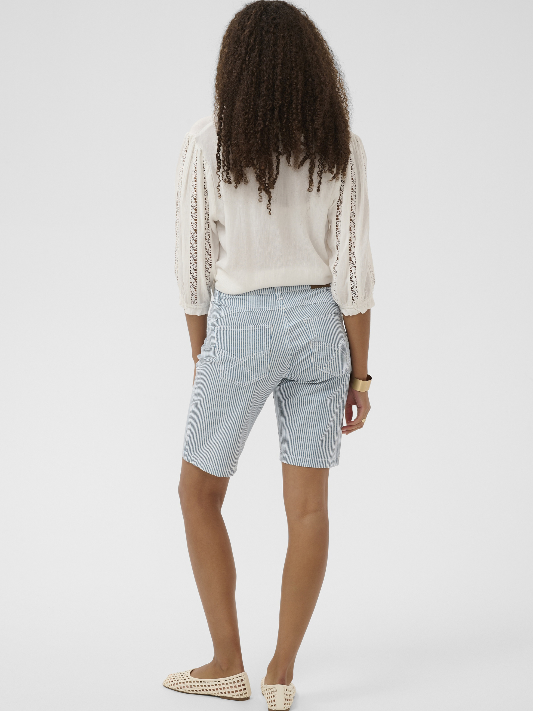 Cream Berta Twill Shorts women’s tailored cotton twill shorts with button fastening and side pockets.