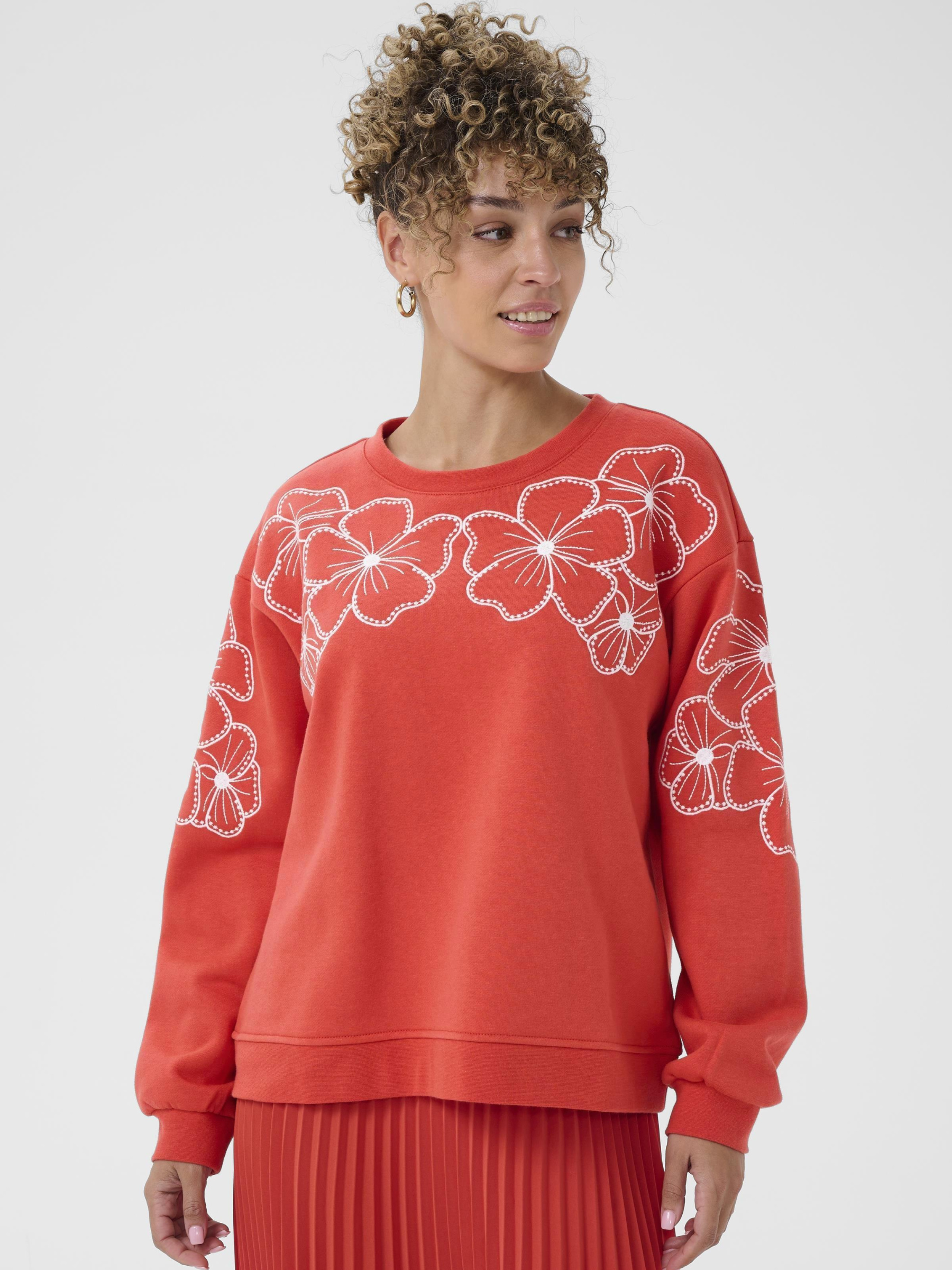 Cream Daria Sweatshirt women’s loose-fit floral sweatshirt with hip-length design for casual everyday wear.