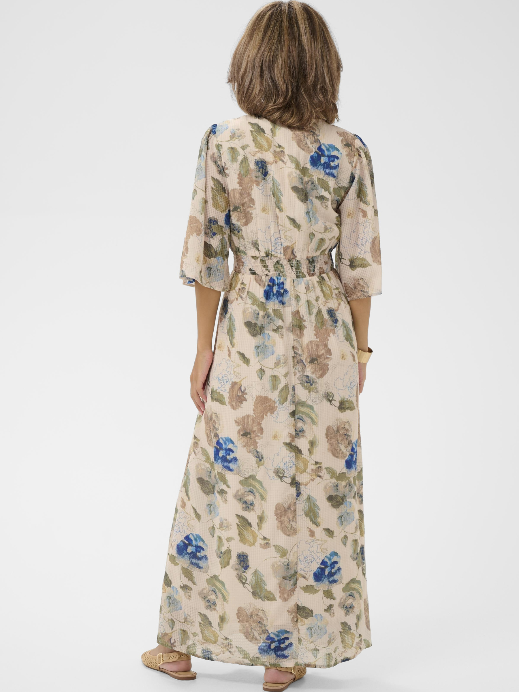 Cream Hailey long floral maxi dress with V-neckline and elbow-length sleeves in lightweight viscose cotton blend.