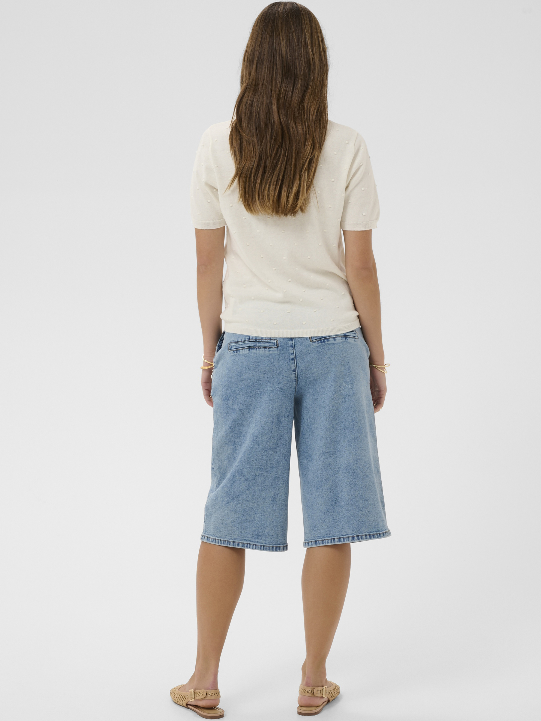 Cream Hanne Knit Pullover lightweight short sleeve textured knit with round neckline.