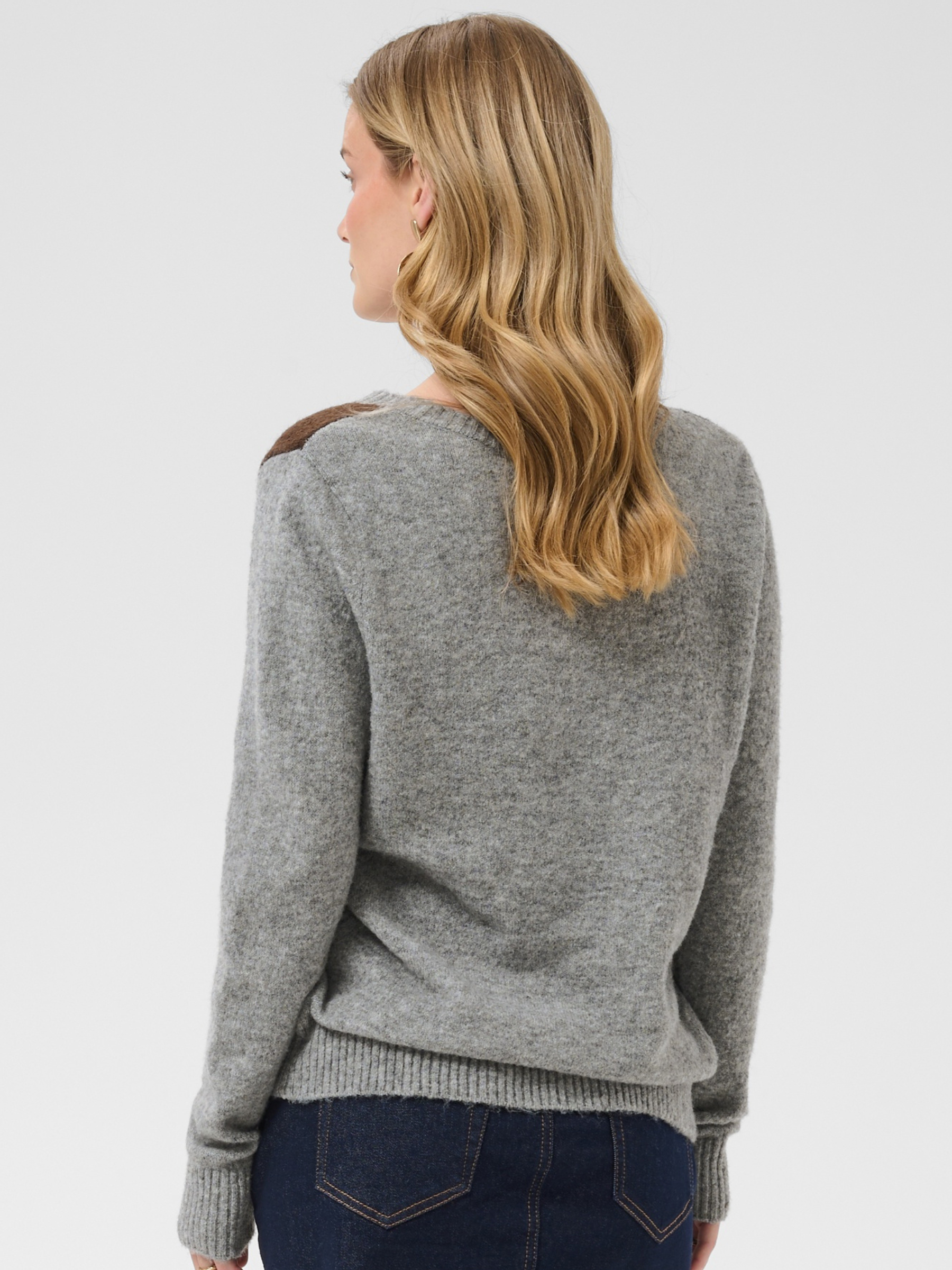 Cream Hope Knit Pullover with V-neckline, diamond pattern, long sleeves and ribbed cuffs