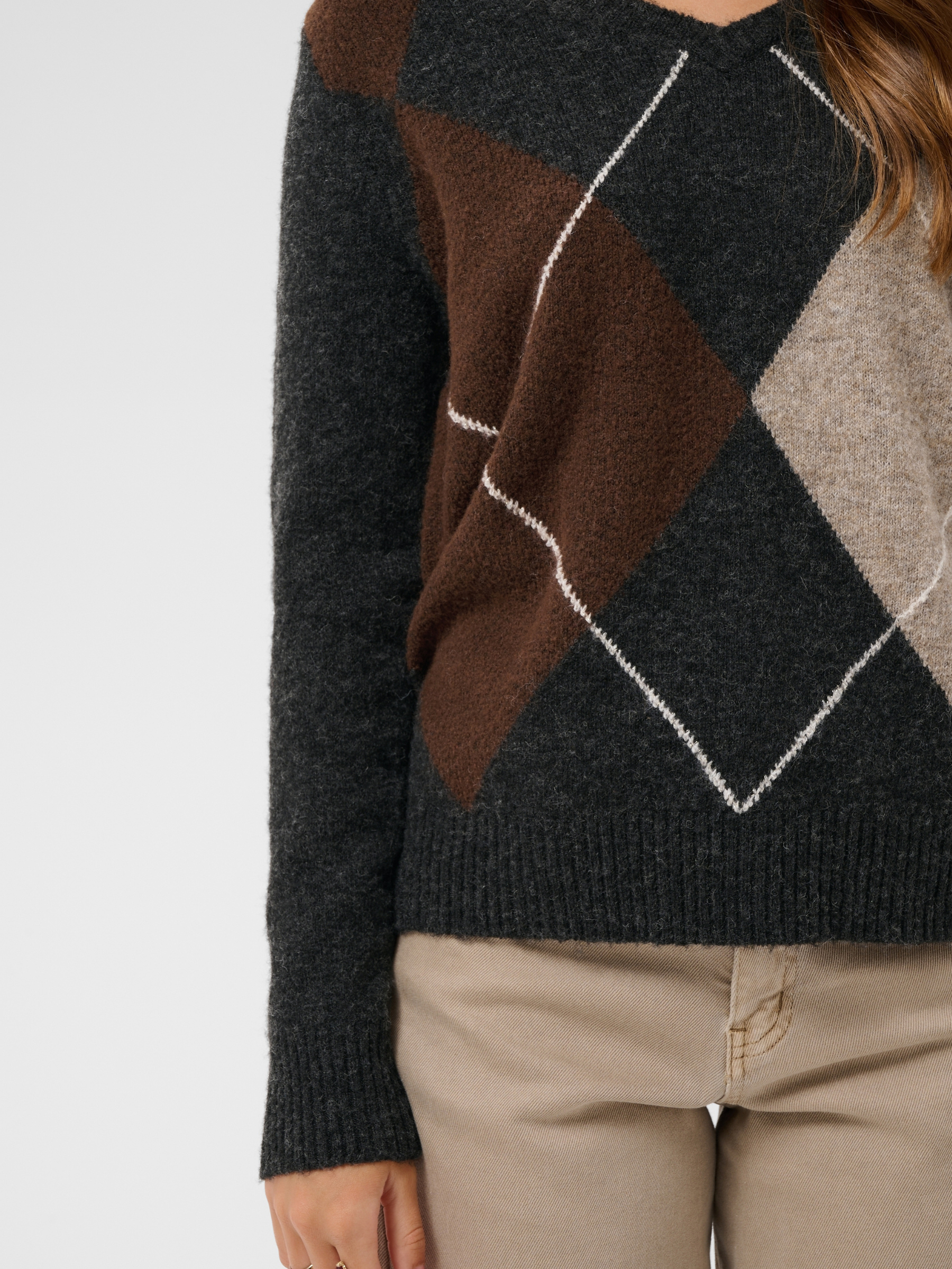 Cream Hope Knit Pullover with V-neckline, diamond pattern, long sleeves and ribbed cuffs