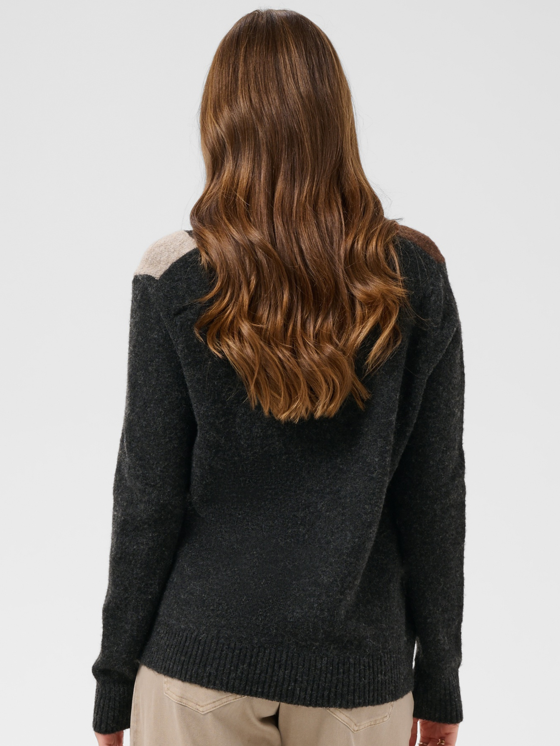 Cream Hope Knit Pullover with V-neckline, diamond pattern, long sleeves and ribbed cuffs
