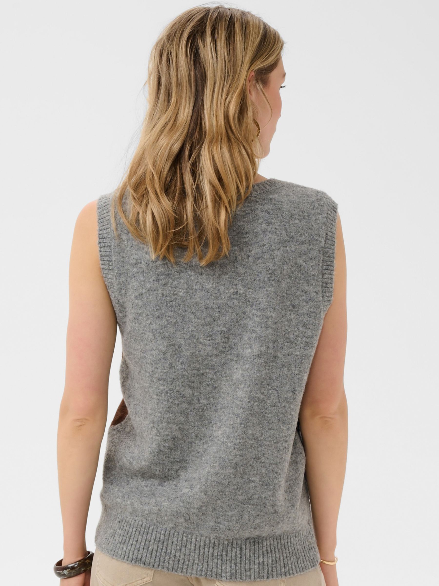 Cream Hope Knit Slipover with V-neckline, sleeveless shape, argyle-style pattern and ribbed trims