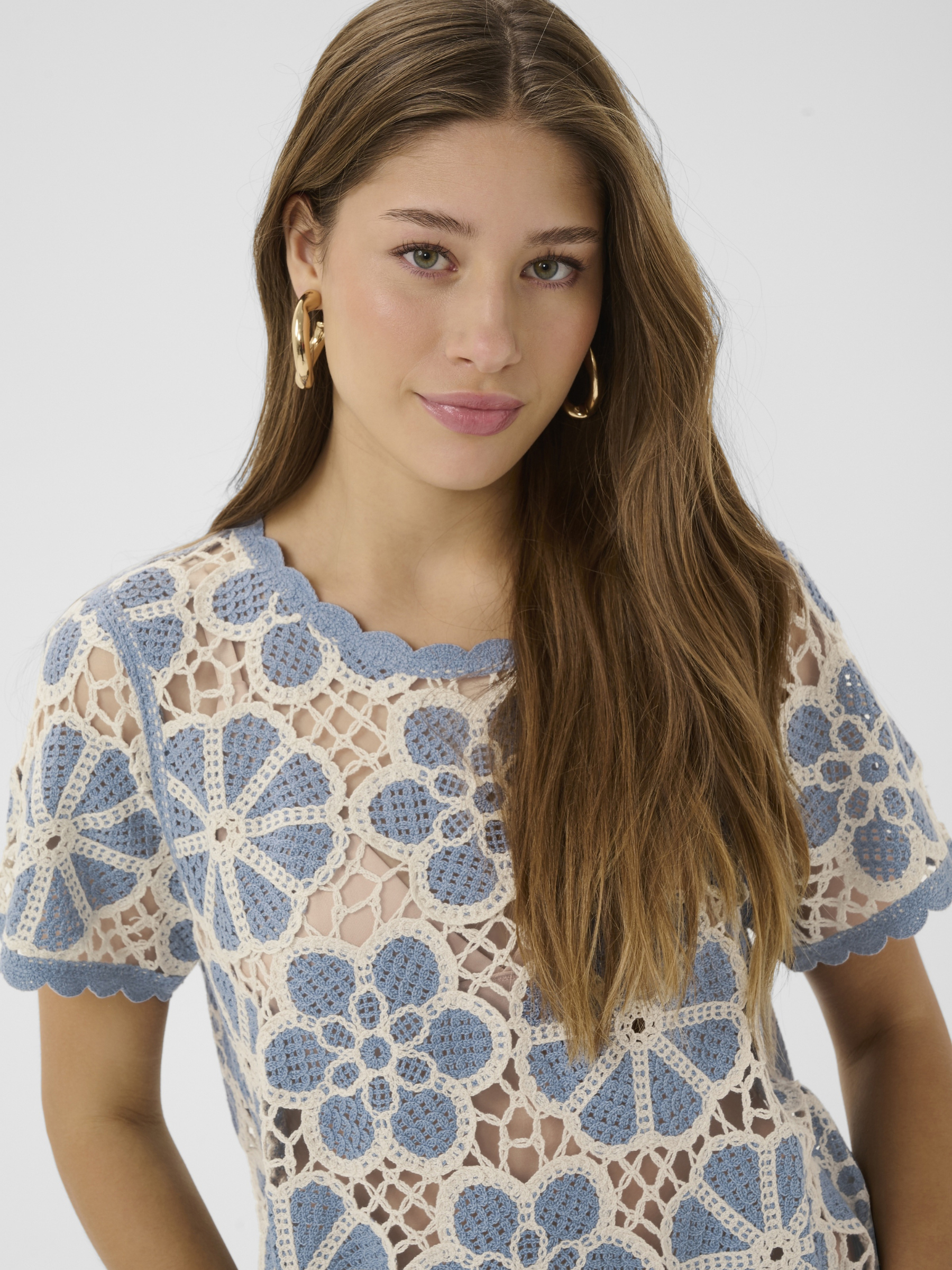 Cream Mallica Crochet Blouse with intricate crochet pattern, short sleeves and regular fit.