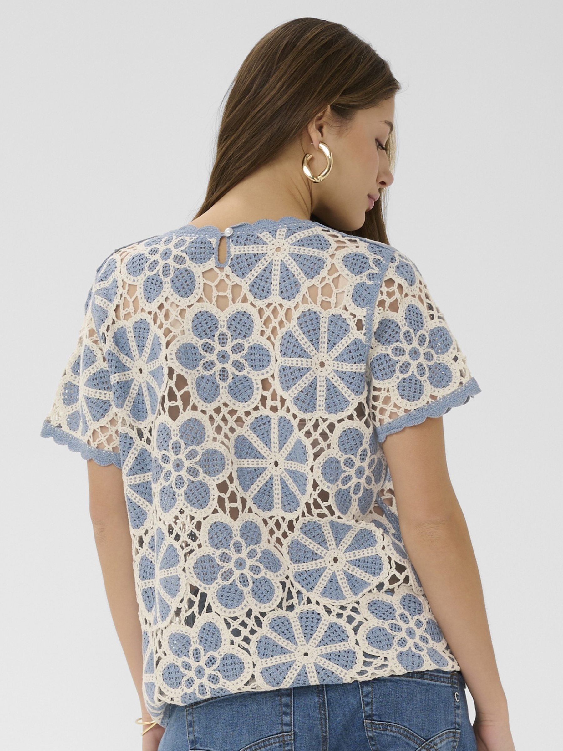 Cream Mallica Crochet Blouse with intricate crochet pattern, short sleeves and regular fit.