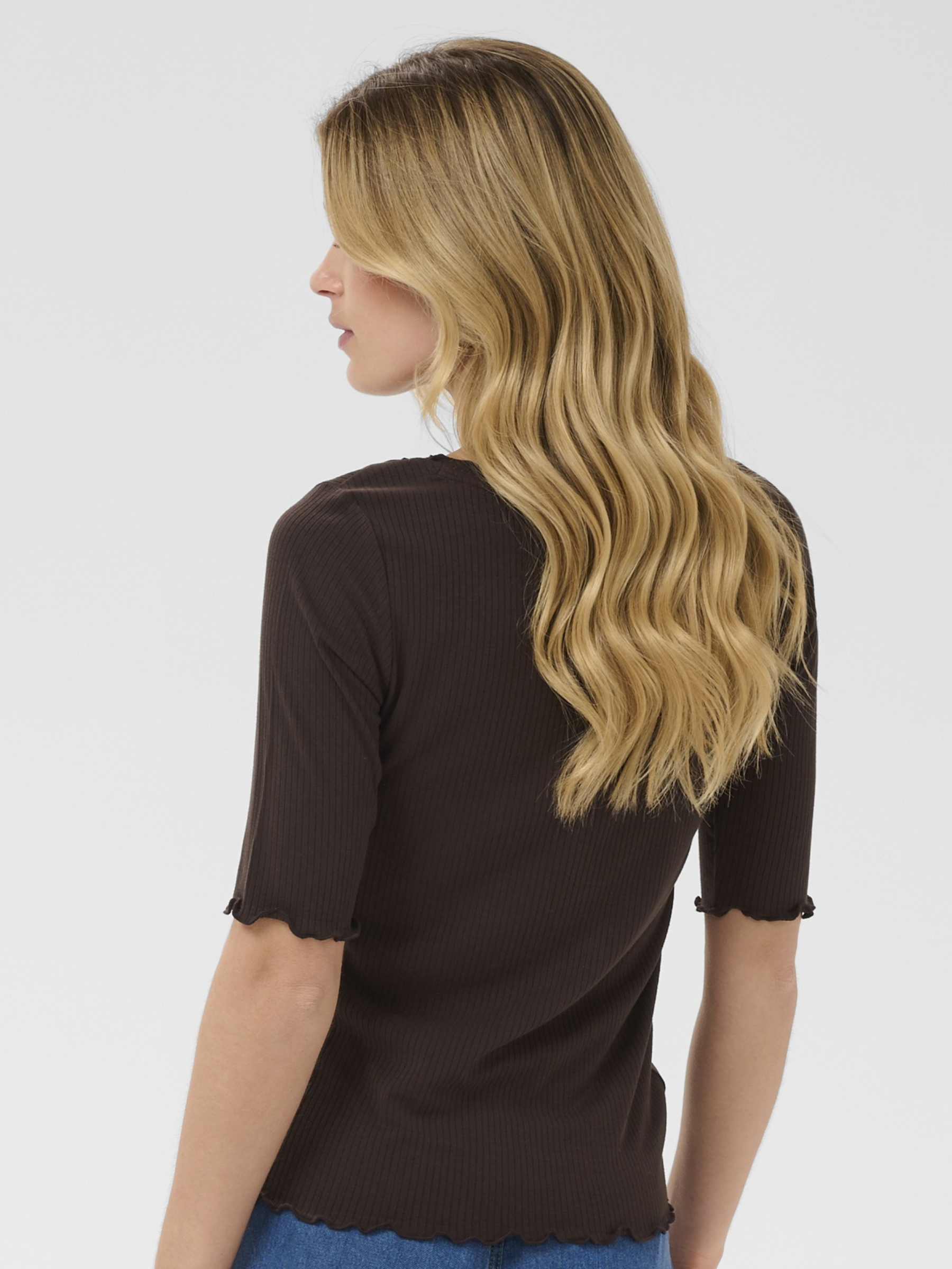 Cream Ribba S/S Blouse ribbed slim fit top with frill neckline and elbow-length sleeves.
