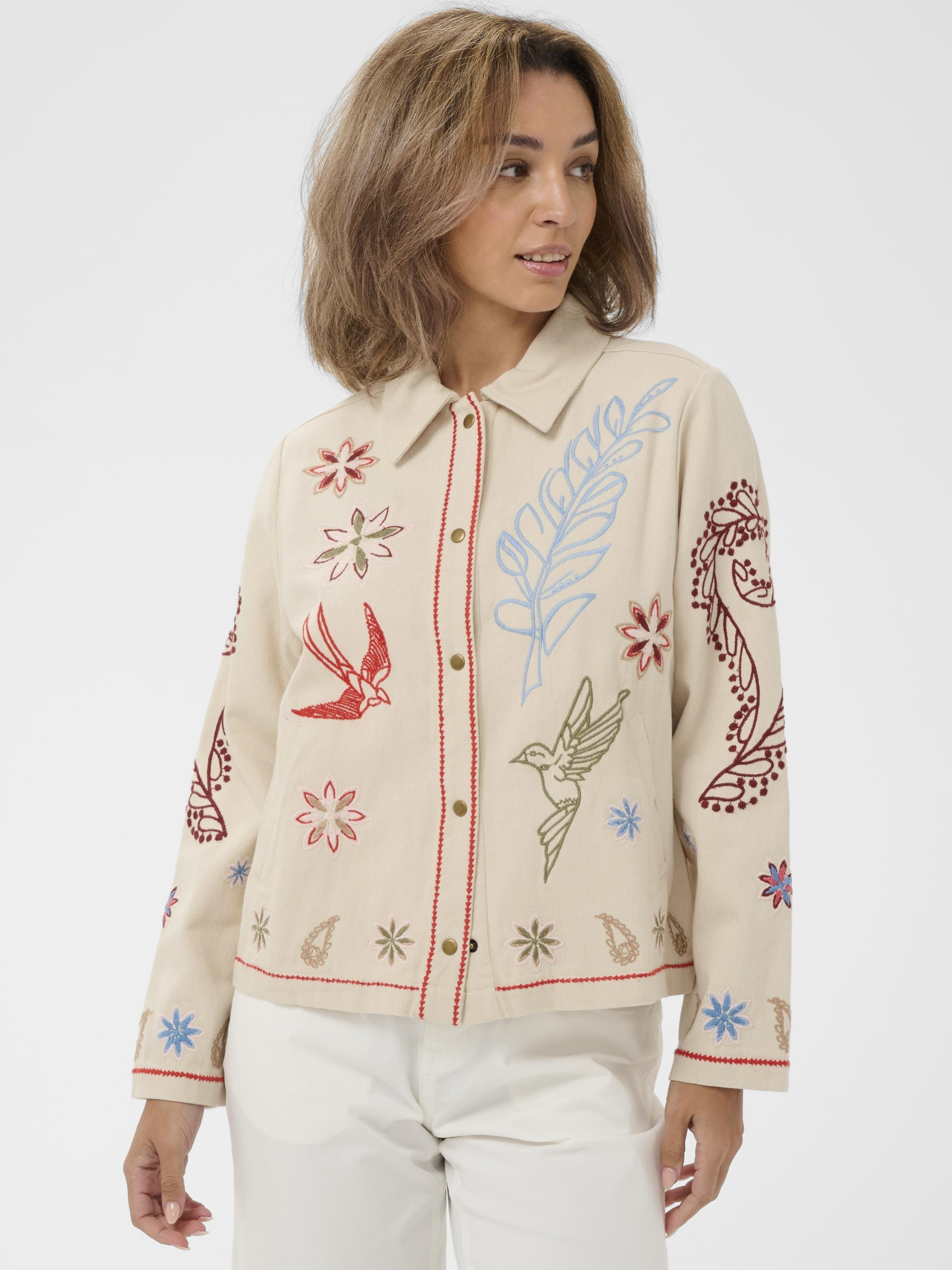 Cream Rosetta Jacket with multicolour embroidered detailing and button-through front in cotton fabric.