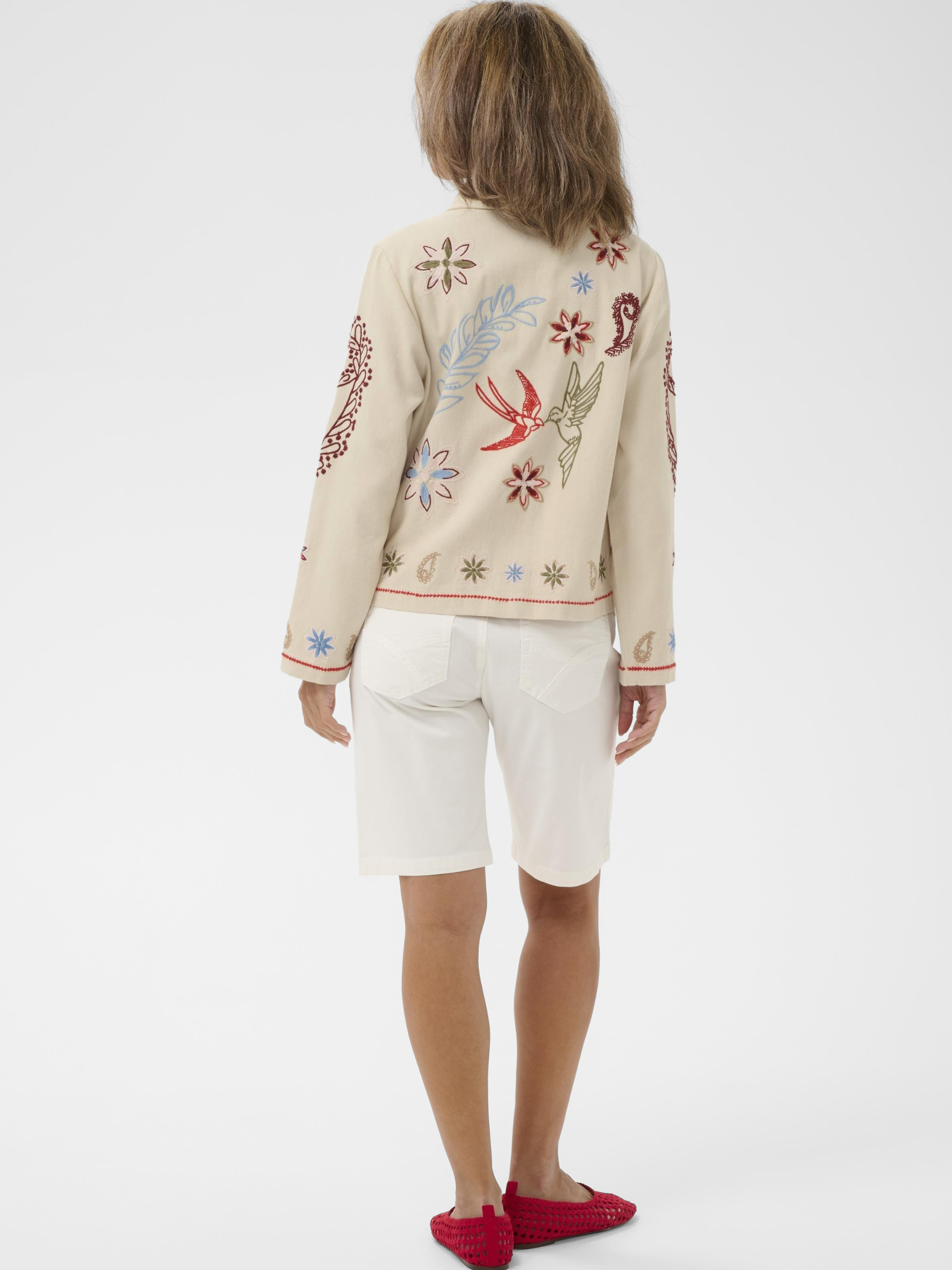 Cream Rosetta Jacket with multicolour embroidered detailing and button-through front in cotton fabric.