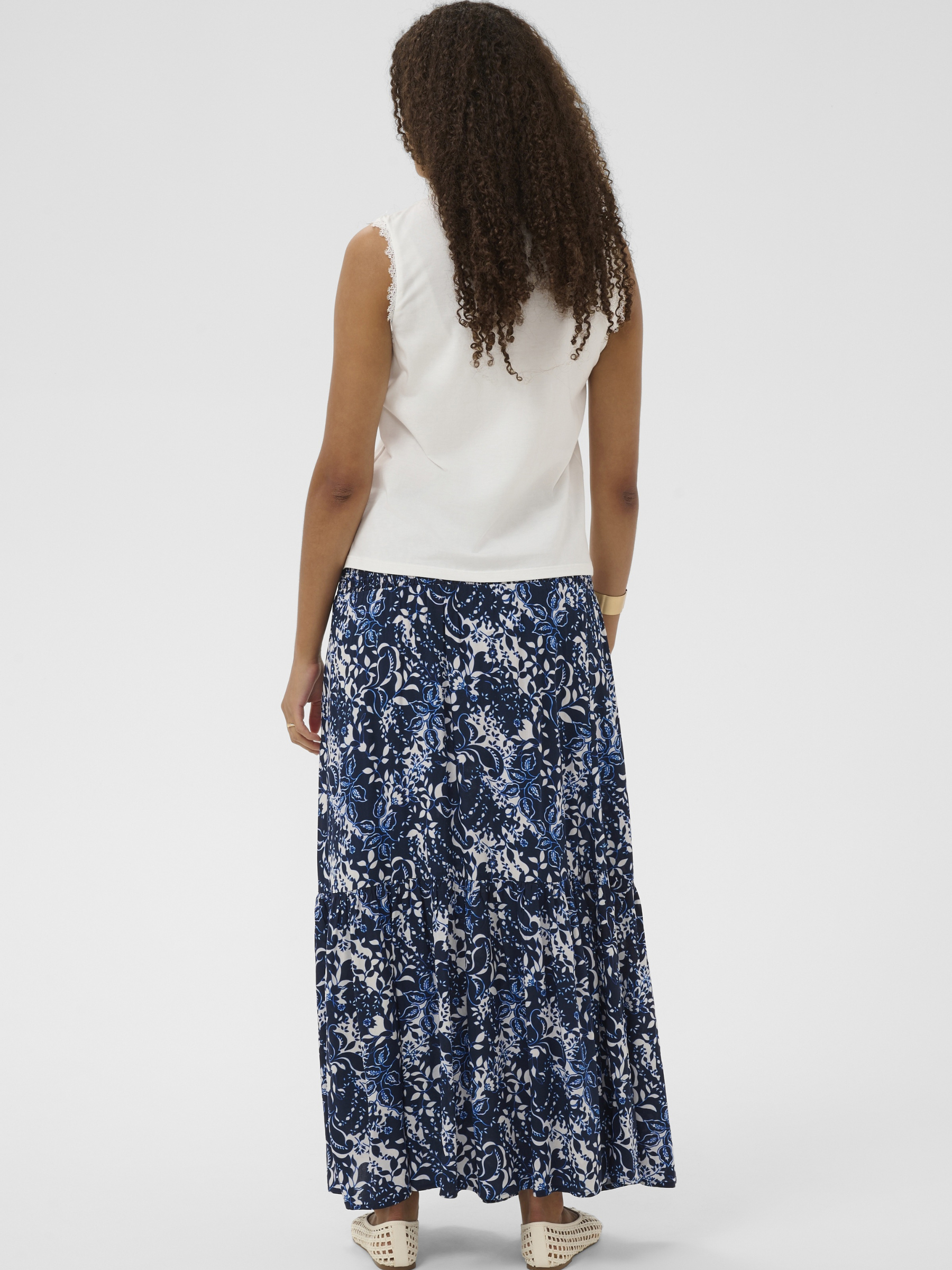 Cream Suny Top sleeveless women’s cotton modal top with lace neckline and keyhole button detail.