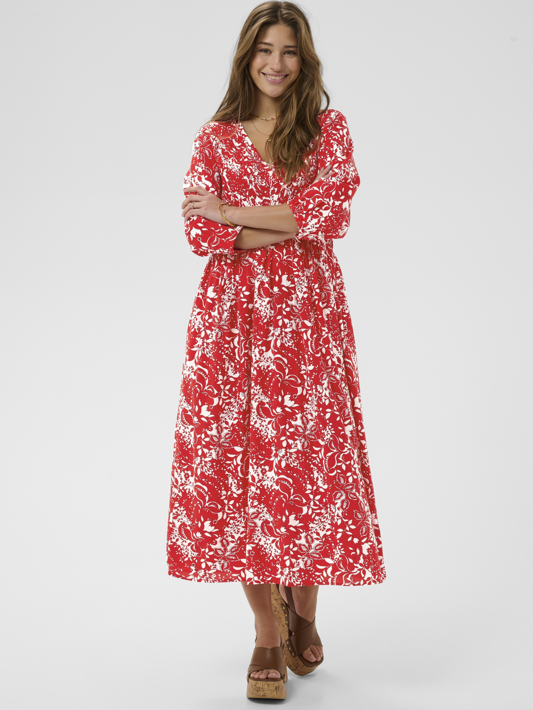 Cream Tiah Smock Dress printed midi dress with V-neckline, empire waist and three-quarter sleeves.