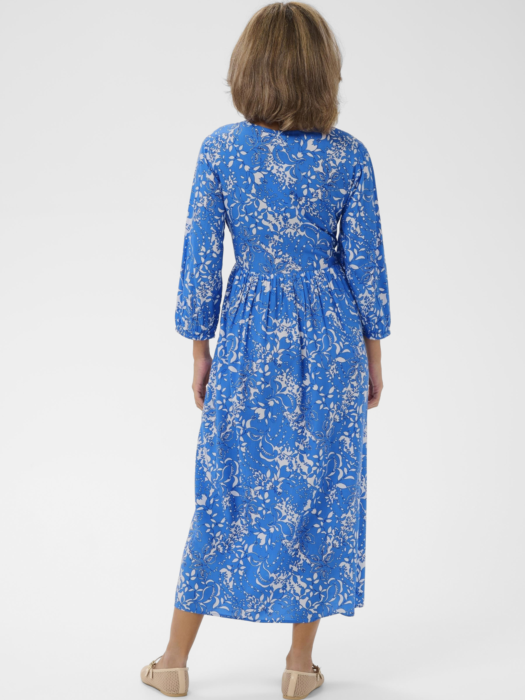 Cream Tiah Smock Dress printed midi dress with V-neckline, empire waist and three-quarter sleeves.
