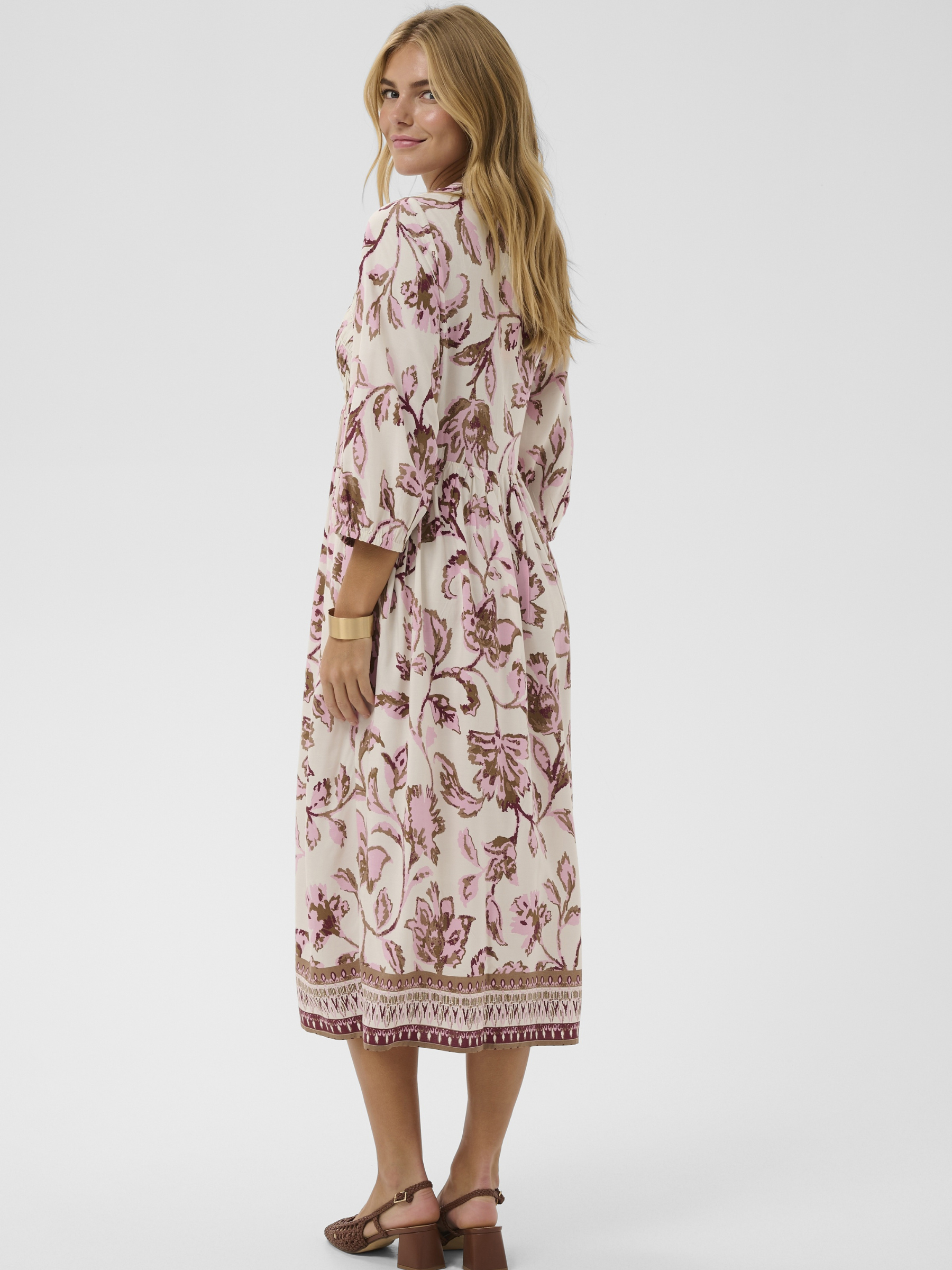 Cream Tiah Smock Dress printed midi dress with V-neckline, empire waist and three-quarter sleeves.