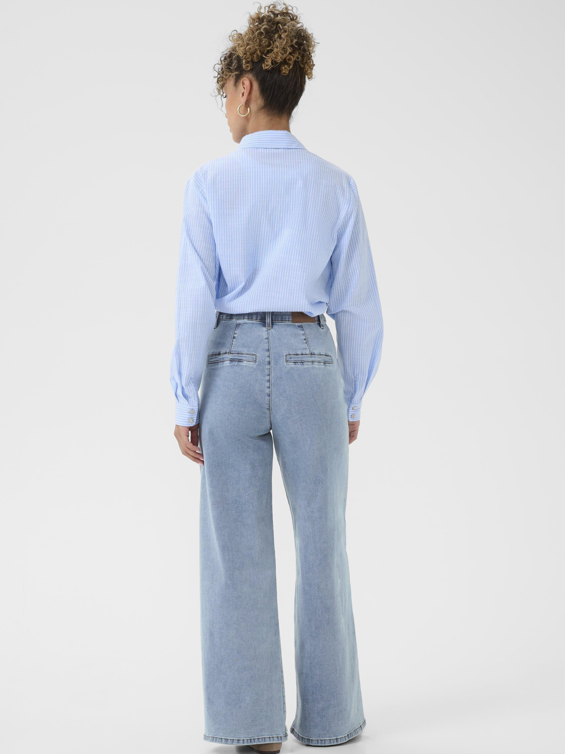 Cream Visti women’s high-waist straight-leg trousers with full-length fit and stretch denim fabric for everyday wear.