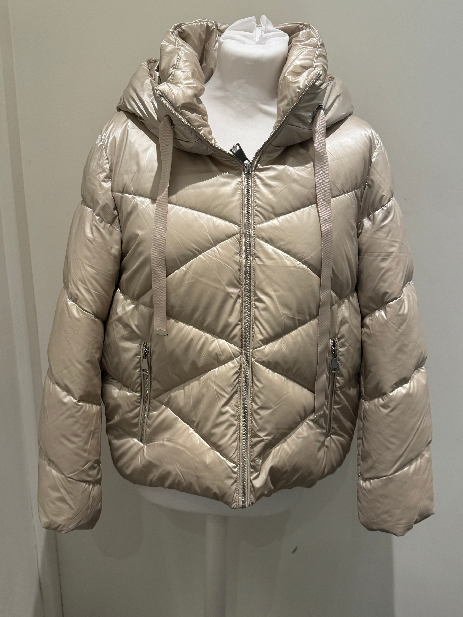 Women's champagne puffer coat with high neck and hood by Deck by Decollage - stylish quilted winter jacket with front zip, drawstring details, and cosy padded design for cold weather layering.