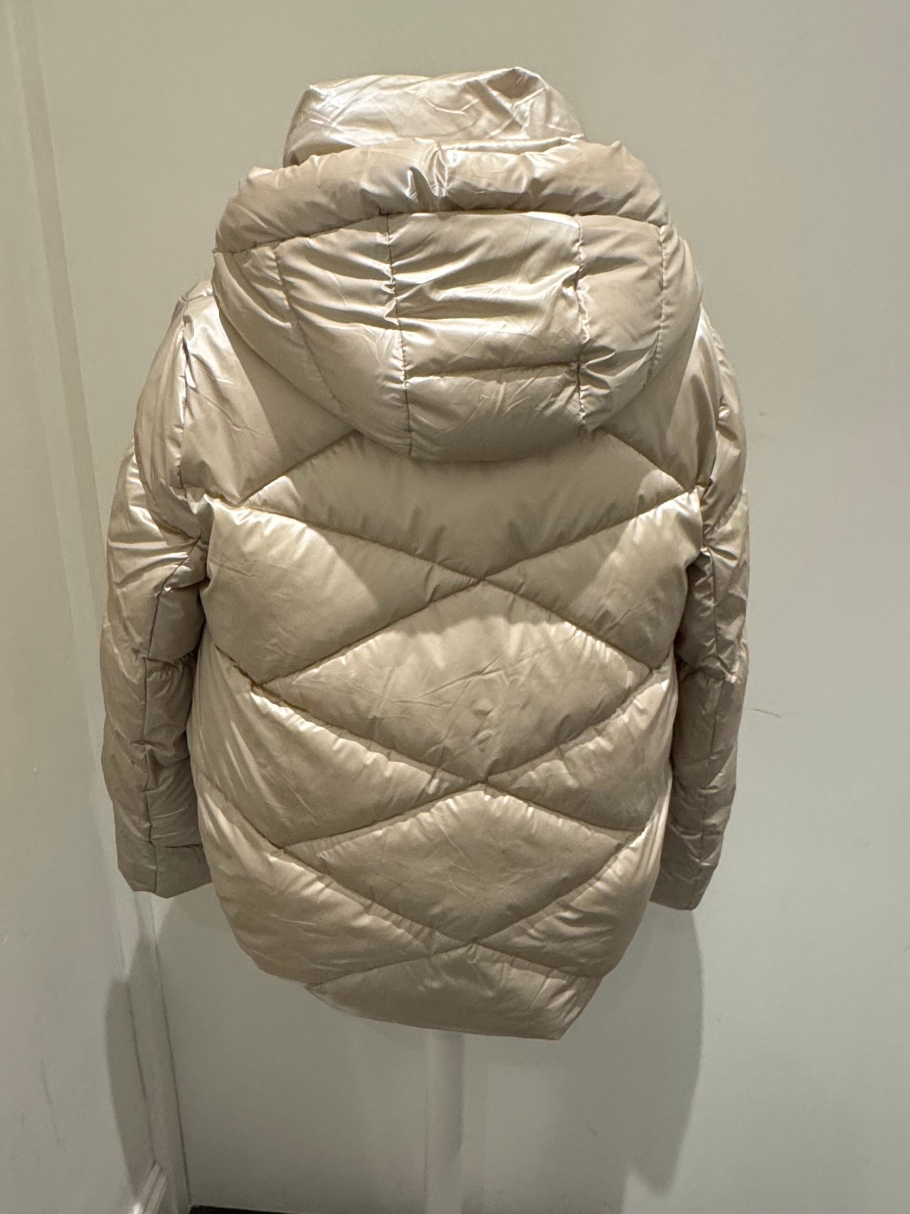 Women's champagne puffer coat with high neck and hood by Deck by Decollage - stylish quilted winter jacket with front zip, drawstring details, and cosy padded design for cold weather layering.