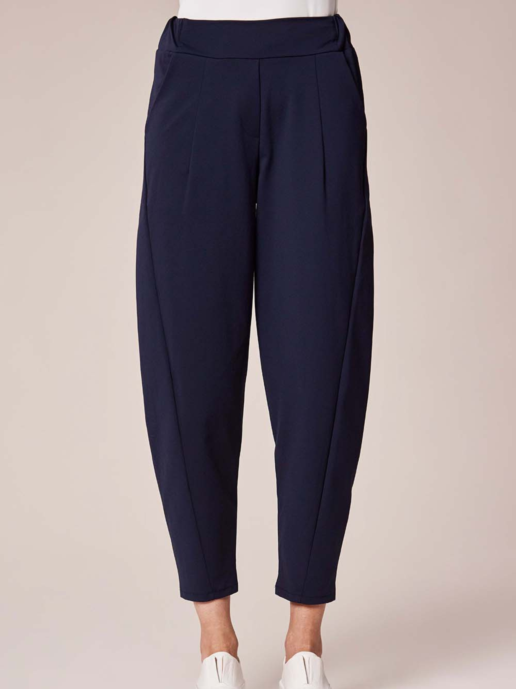 Deck By Decollage 2511 tapered tailored trousers with high-rise waistband and cropped ankle-length finish.