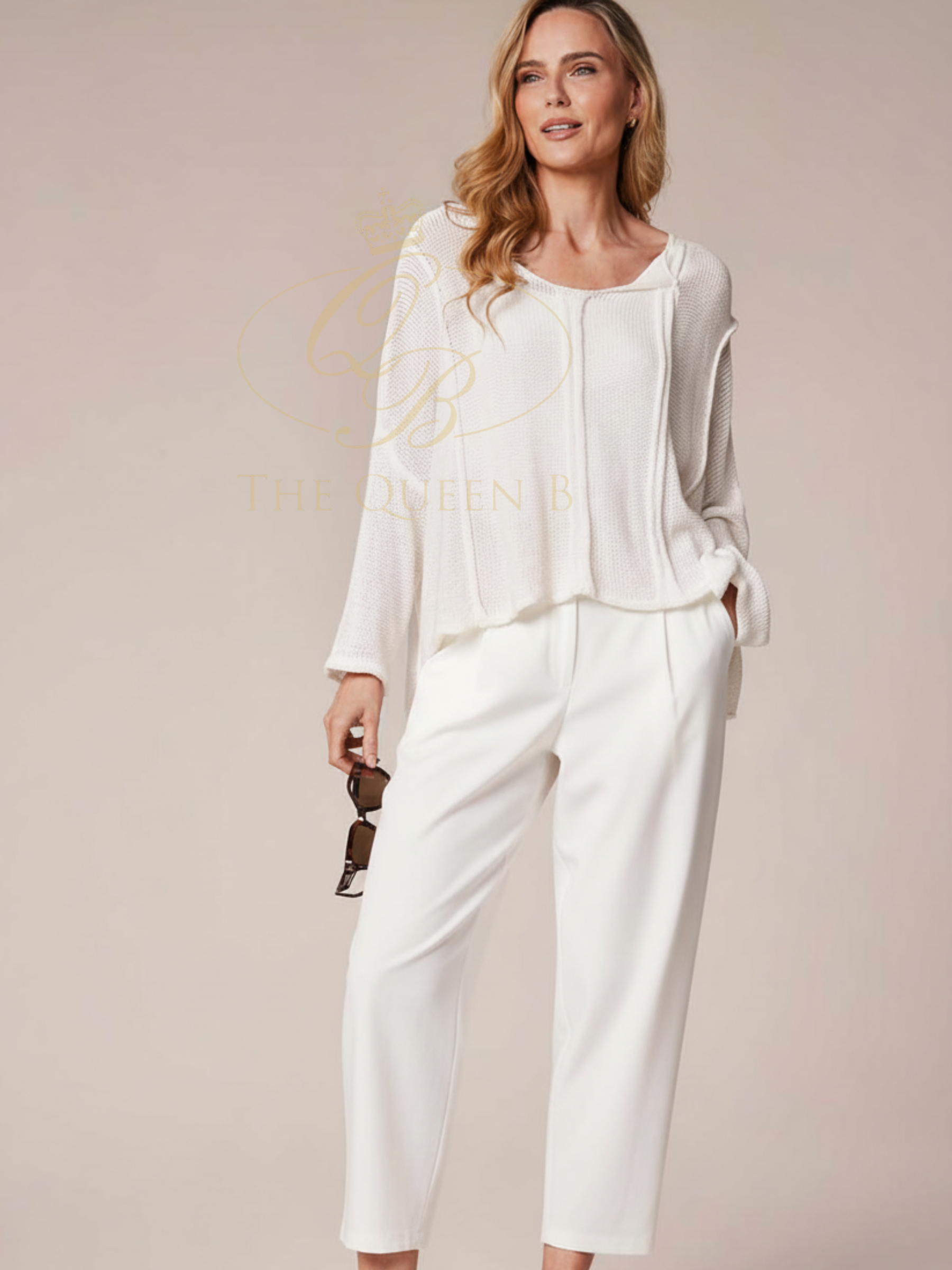  Deck By Decollage 2511 tapered tailored trousers with high-rise waistband and cropped ankle-length finish.