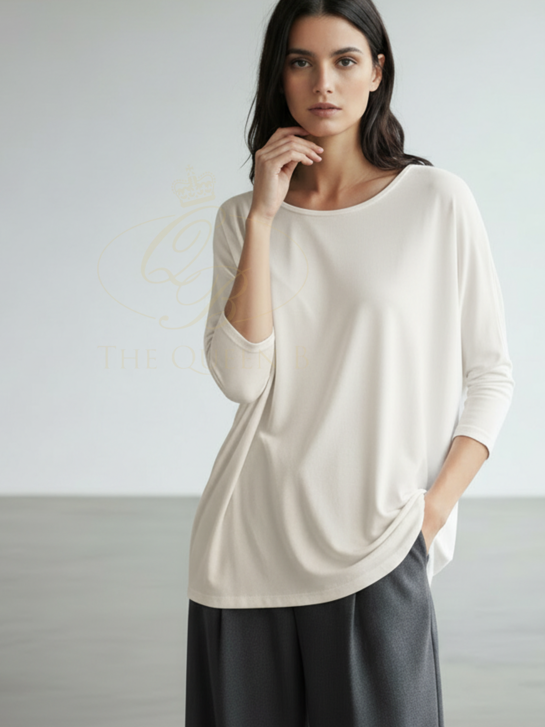 Deck By Decollage 2731 women’s relaxed fit top with round neckline and three-quarter sleeves.