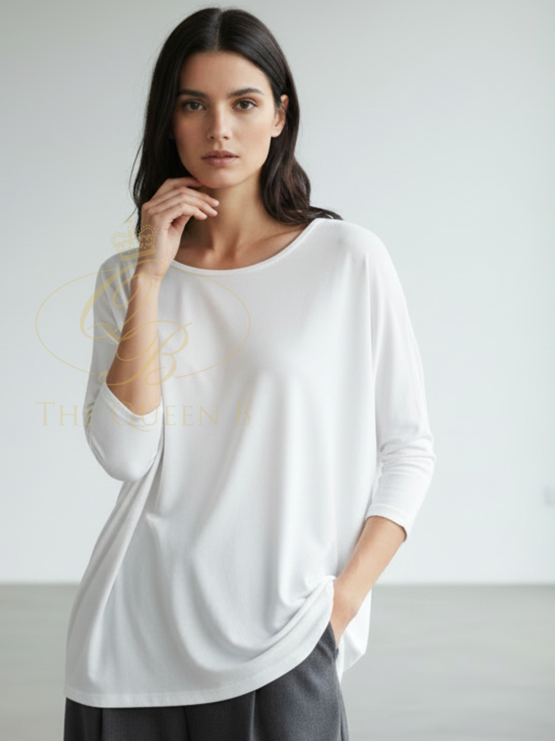Deck By Decollage 2731 women’s relaxed fit top with round neckline and three-quarter sleeves.
