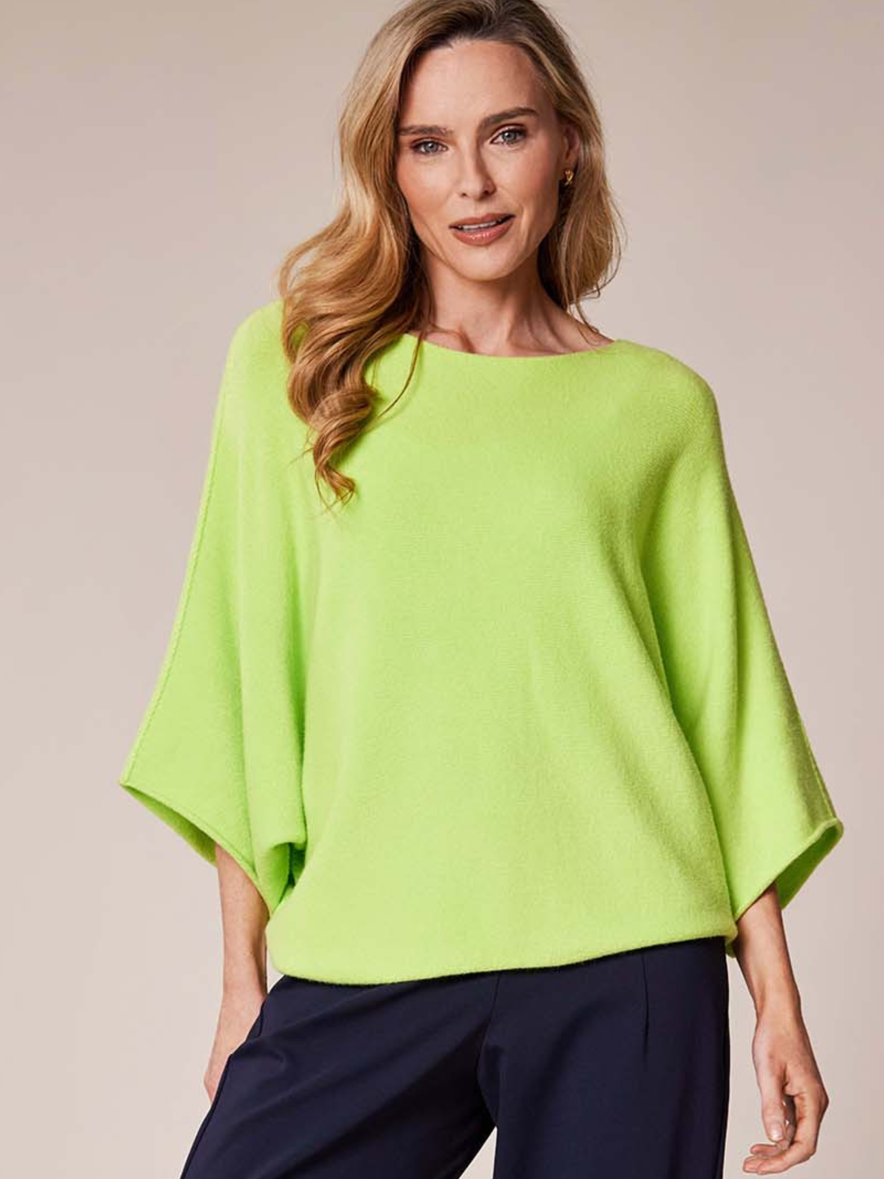 Deck By Decollage 57702 wide boat neck batwing knit top with relaxed draped silhouette.