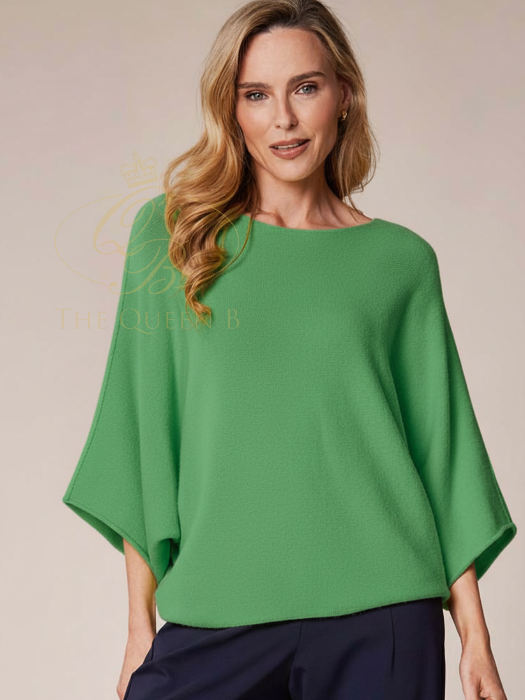 Deck By Decollage 57702 wide boat neck batwing knit top with relaxed draped silhouette.