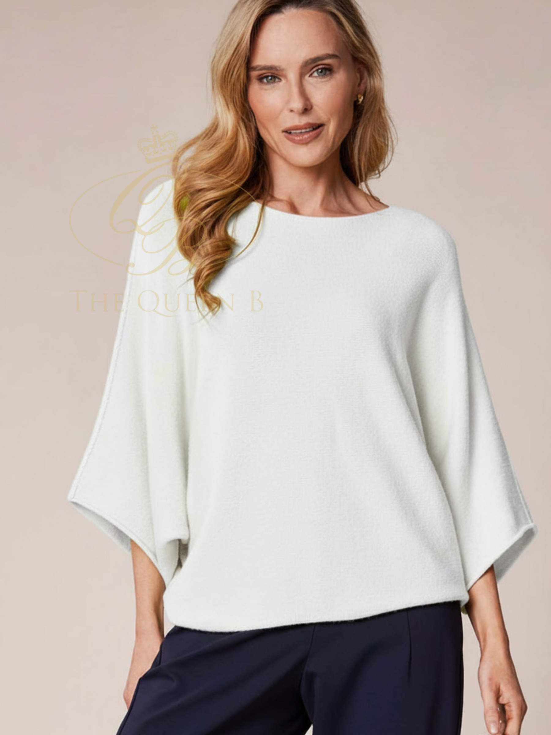 Deck By Decollage 57702 wide boat neck batwing knit top with relaxed draped silhouette.