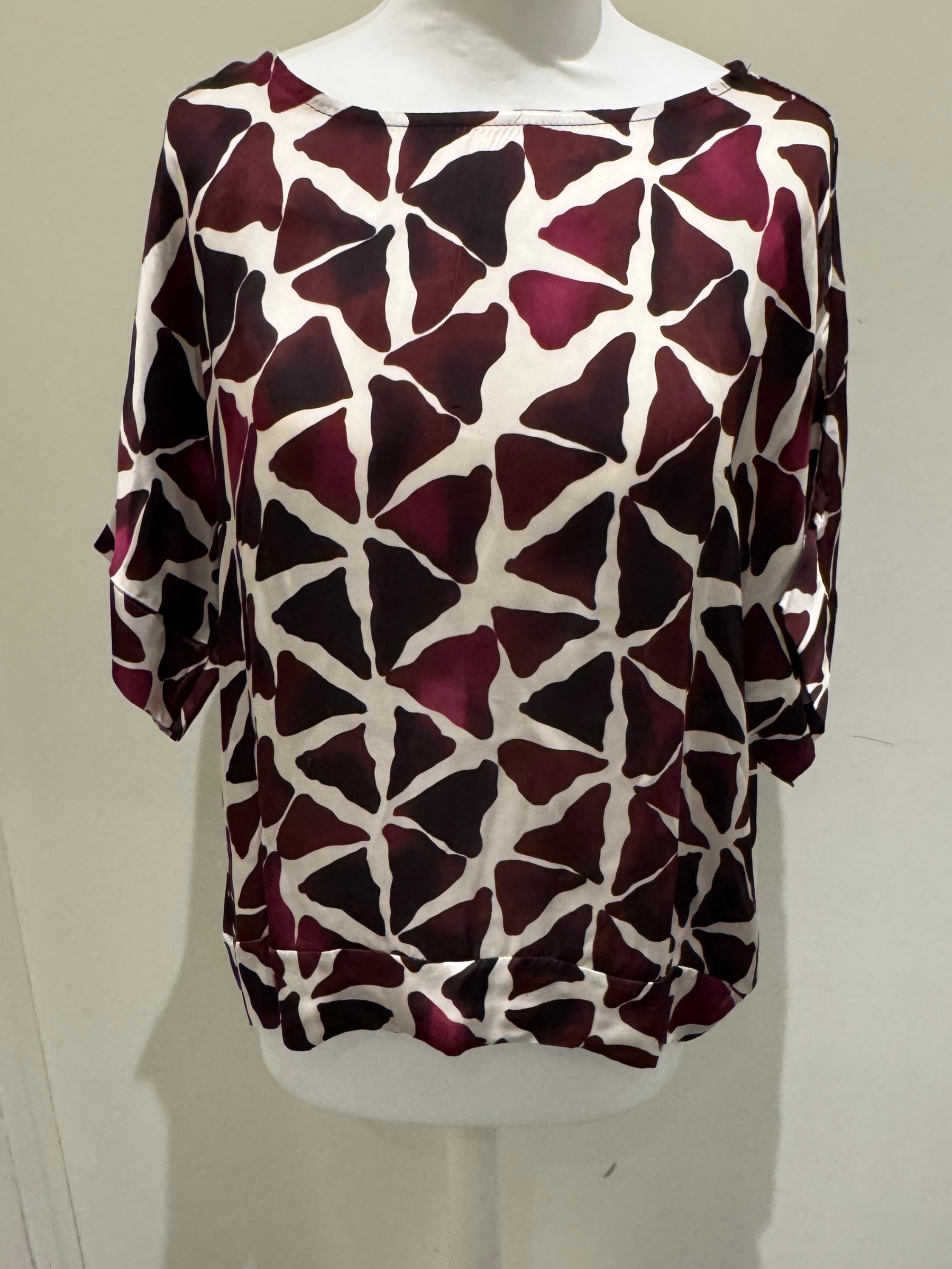 Deck by Decollage abstract Mulberry printed  top in berry and neutral tones, featuring a wide neckline and relaxed silhouette. Made from lightweight viscose for breathable comfort-perfect for bold, contemporary styling or matching co-ord looks.