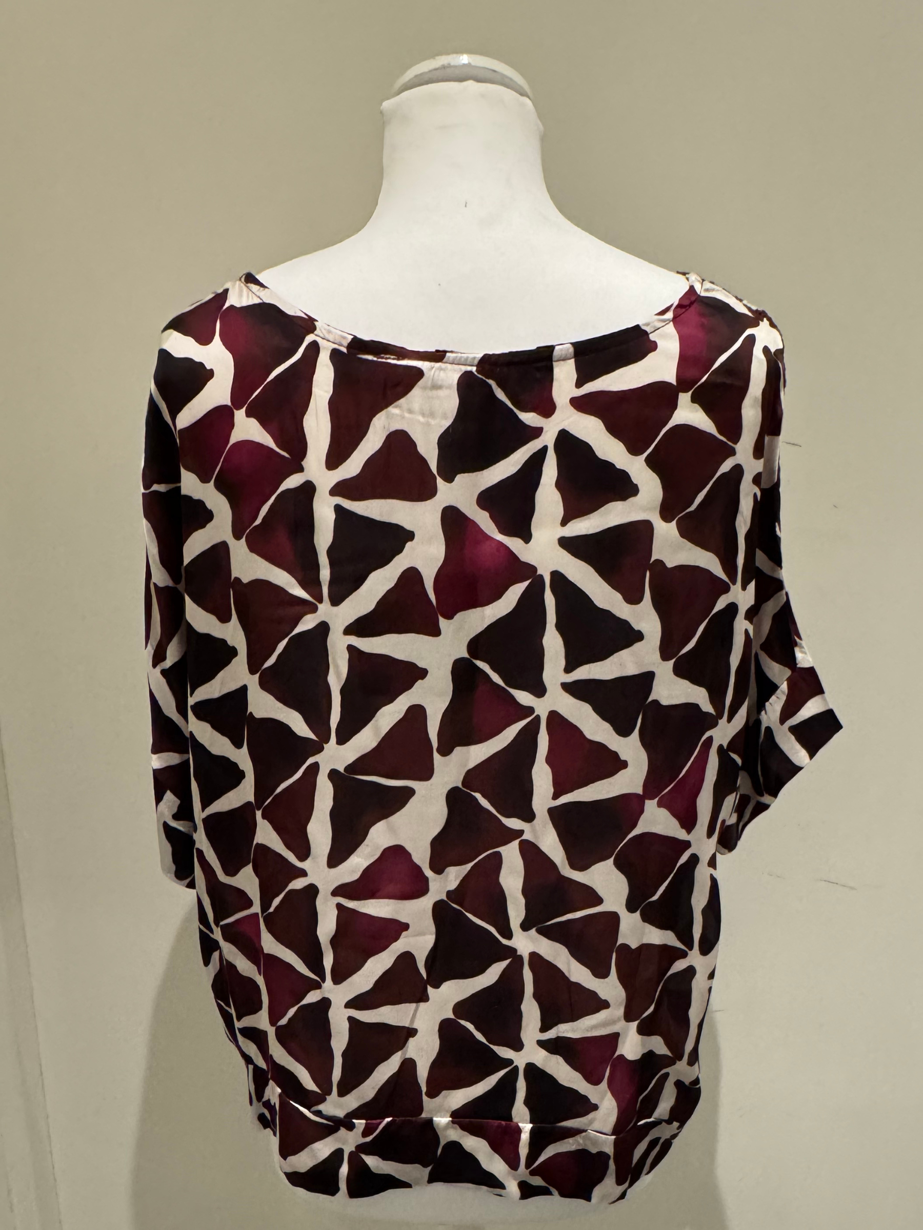 Deck by Decollage abstract Mulberry printed  top in berry and neutral tones, featuring a wide neckline and relaxed silhouette. Made from lightweight viscose for breathable comfort-perfect for bold, contemporary styling or matching co-ord looks.