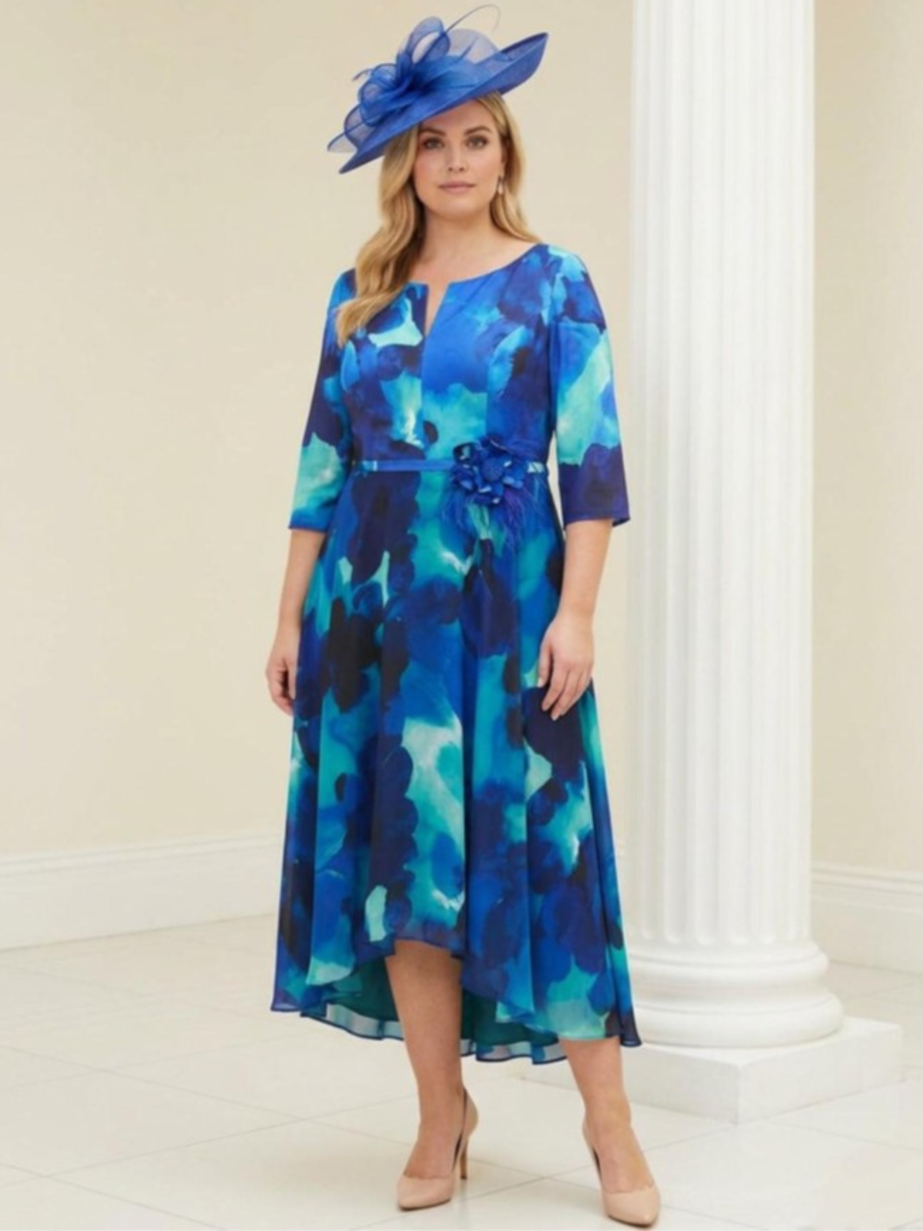 Dressed Up DU718K Blue Turquoise Dress with fit and flare shape, three-quarter sleeves and floral waist detail