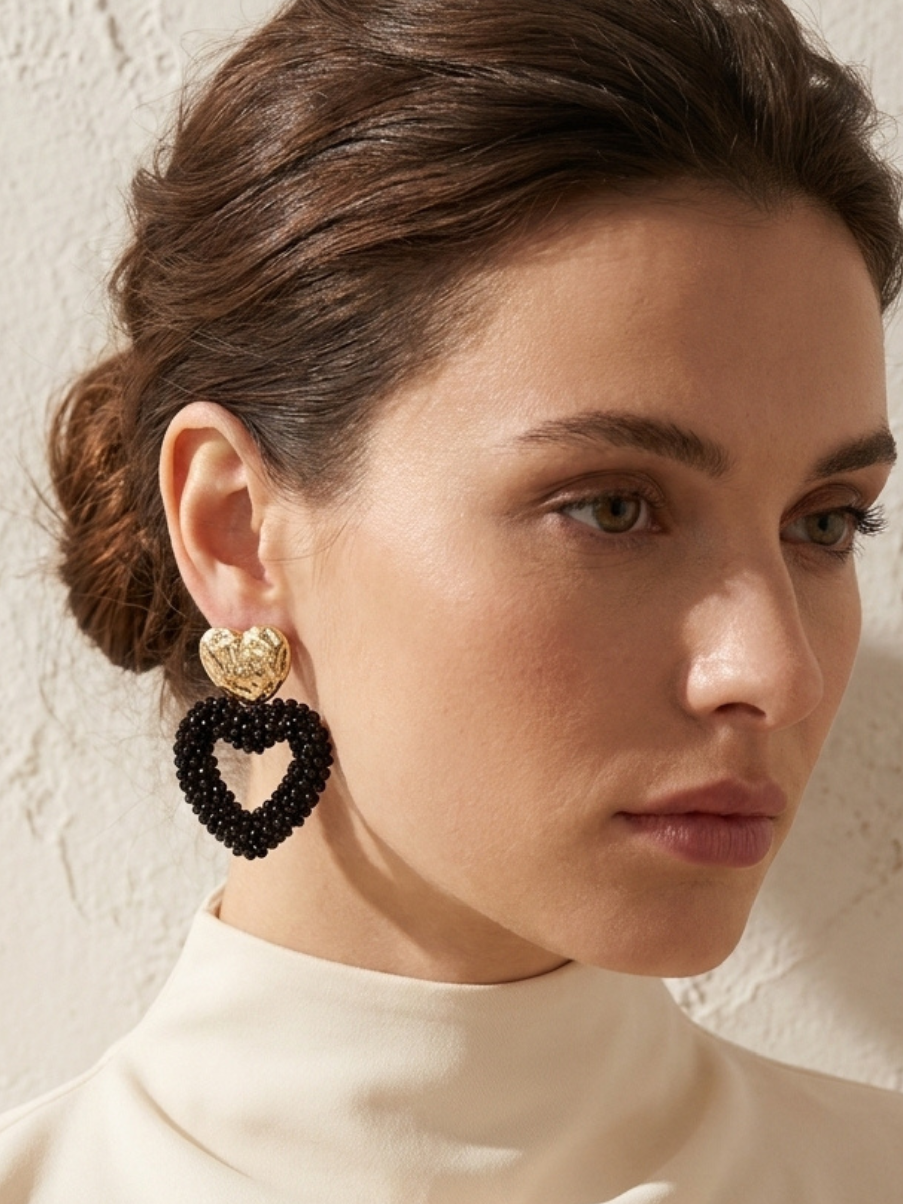 Envy 4734 Heart Shaped Faceted Beaded Earrings with textured heart studs and open heart drops covered in faceted beads.