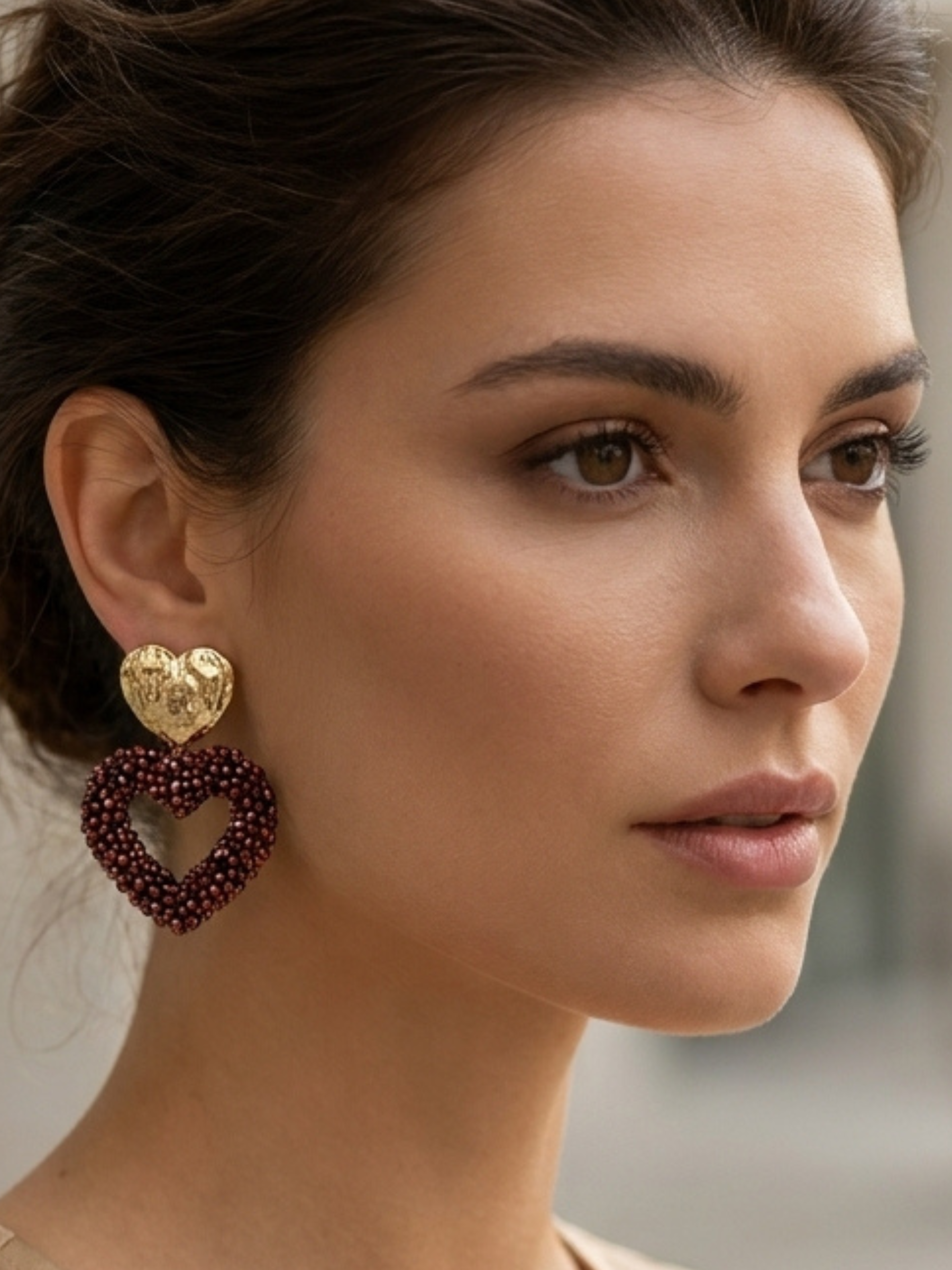 Envy 4734 Heart Shaped Faceted Beaded Earrings with textured heart studs and open heart drops covered in faceted beads.