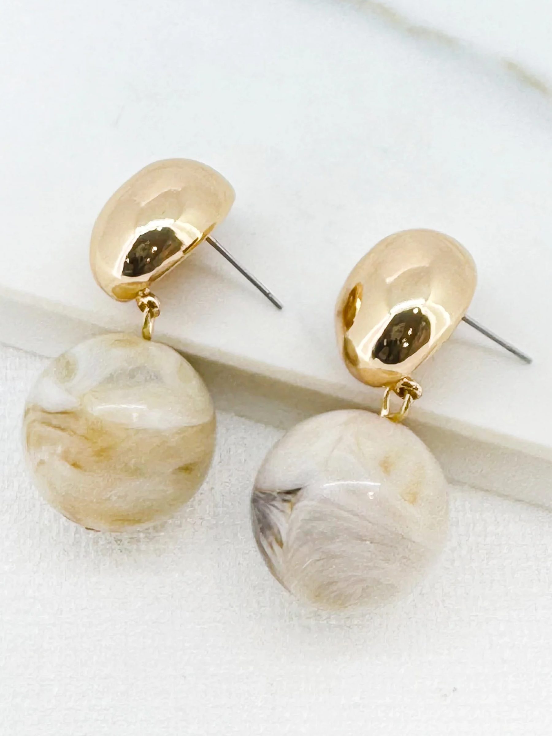 Envy 4842 Marble Ball Studded Earrings with marble-effect sphere drop and polished stud top.
