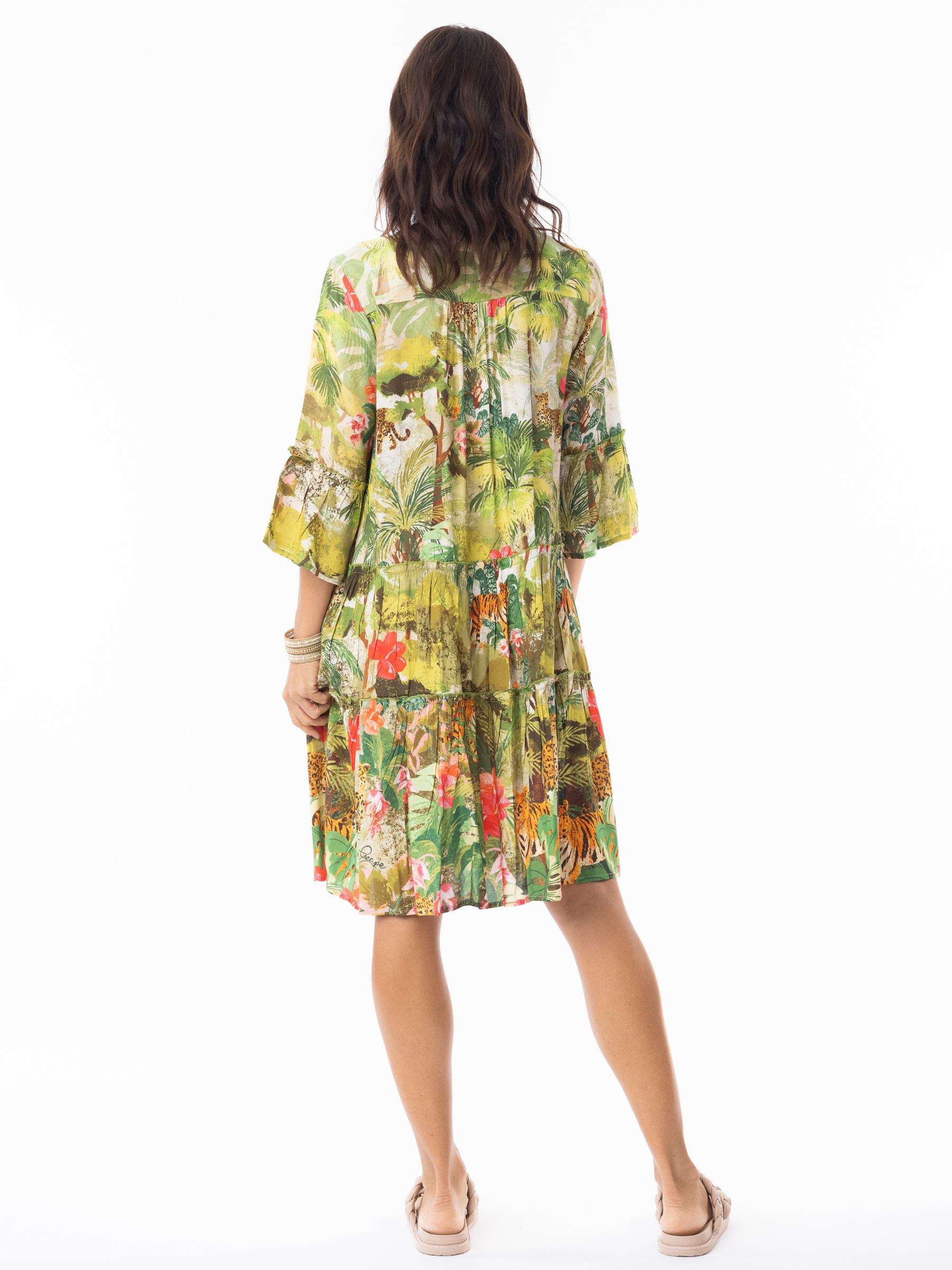 Escape 10051 Cecilia Dress with notch neckline, three-quarter sleeves and tiered A-line silhouette in vibrant jungle-inspired print.