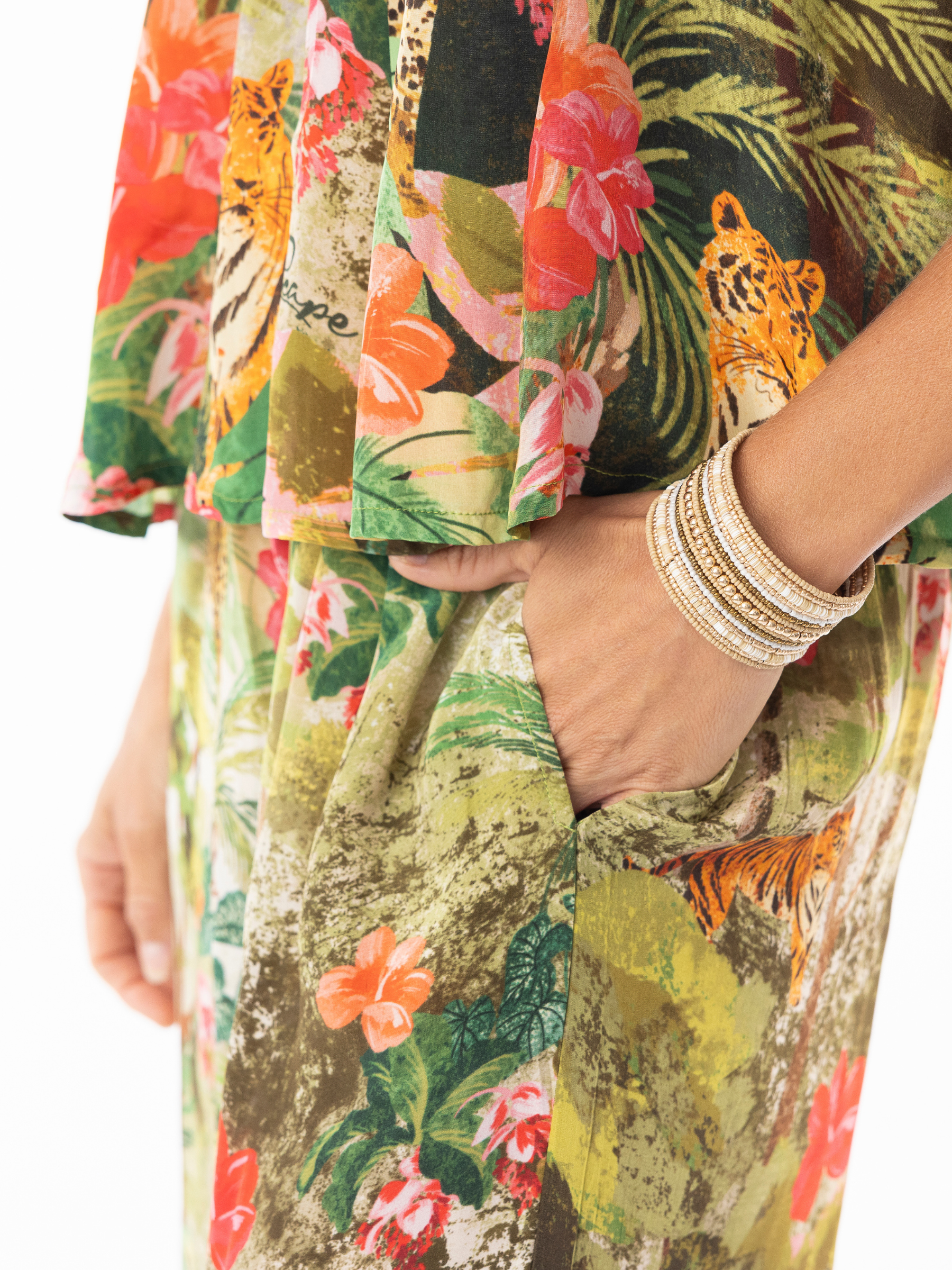 Escape 16003 Cecilia wide-leg trousers with elasticated waistband and vibrant jungle-inspired print, styled with matching cami top.