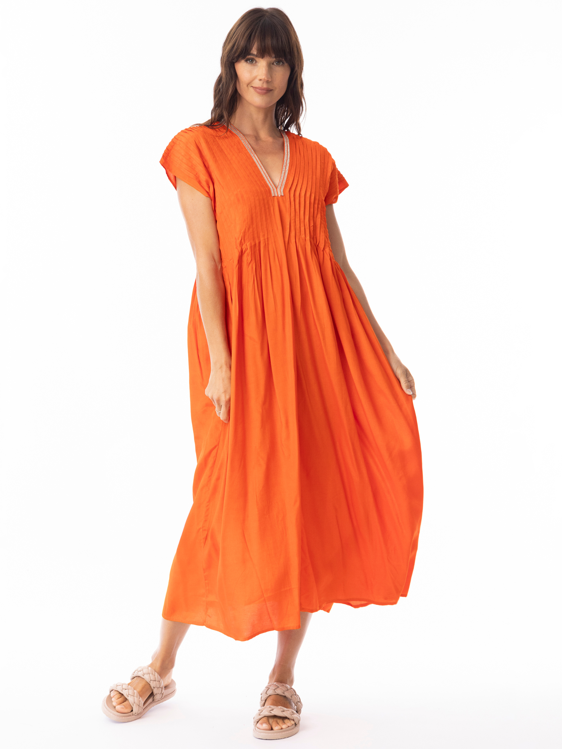 Escape 51903 Lux Pleated Mandarin Dress with mandarin neckline, pleated bodice detailing, cap sleeves and relaxed flowing midi silhouette.