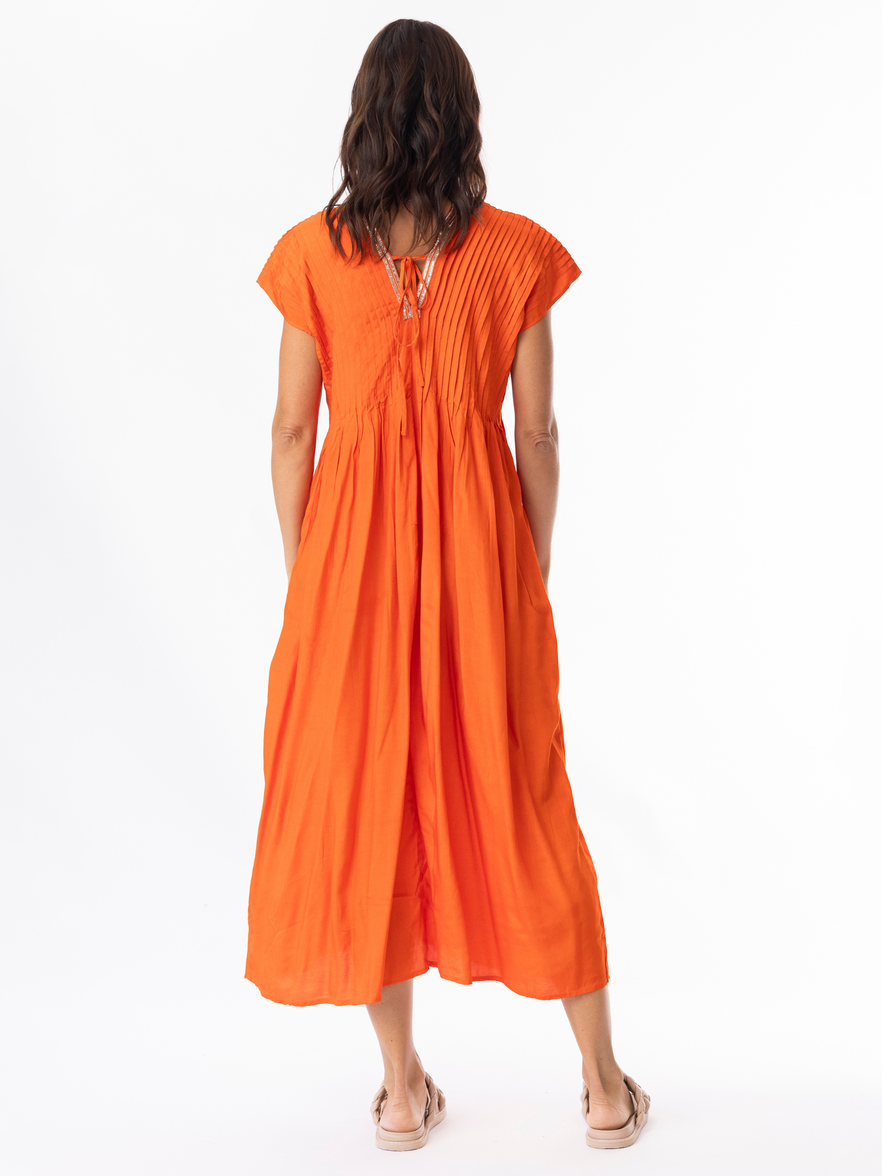 Escape 51903 Lux Pleated Mandarin Dress with mandarin neckline, pleated bodice detailing, cap sleeves and relaxed flowing midi silhouette.